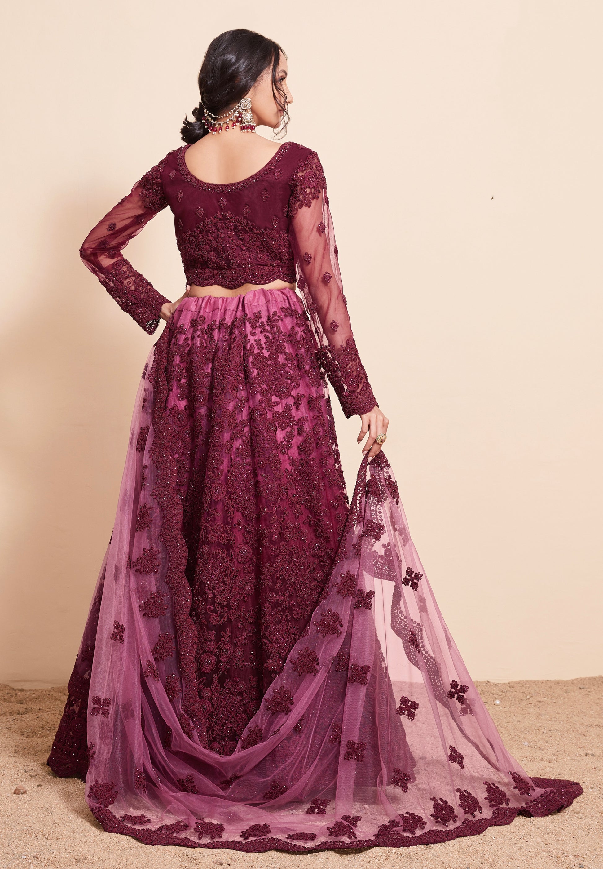 Rich Wine Net Lehenga Choli Set with Heavy Stone Work Embellishment