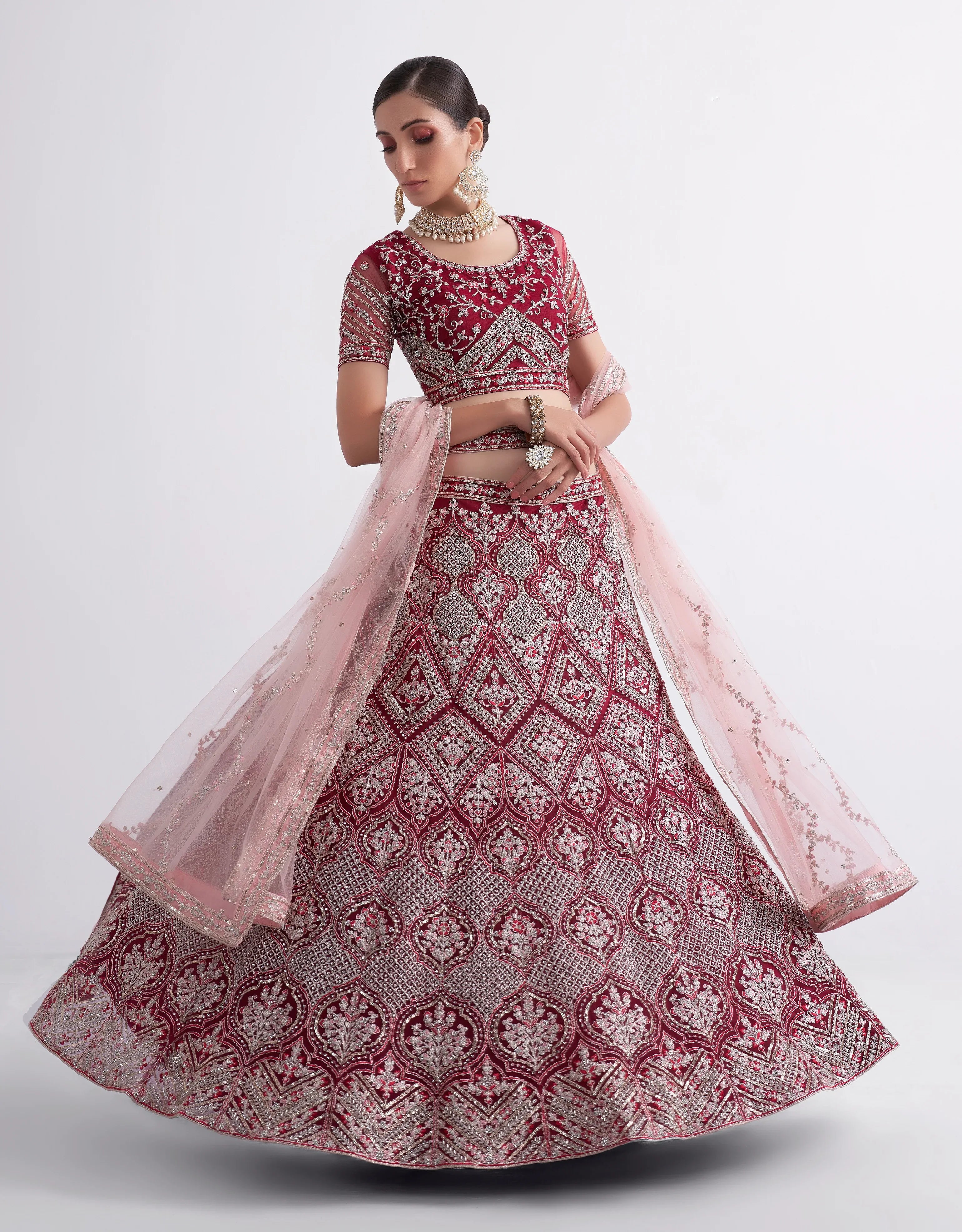 Maroon Net Lehenga Choli Set with Heavy Stone Work Embellishment