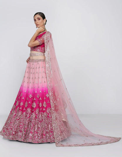 Elegant shaded pink net blouse &amp; lehenga set with silk inner and net dupatta.