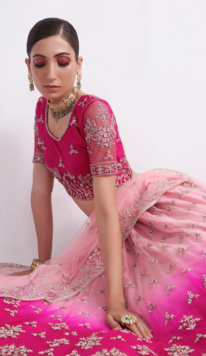 Elegant shaded pink net blouse &amp; lehenga set with silk inner and net dupatta.