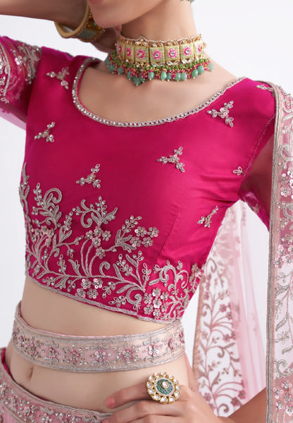 Elegant shaded pink net blouse &amp; lehenga set with silk inner and net dupatta.