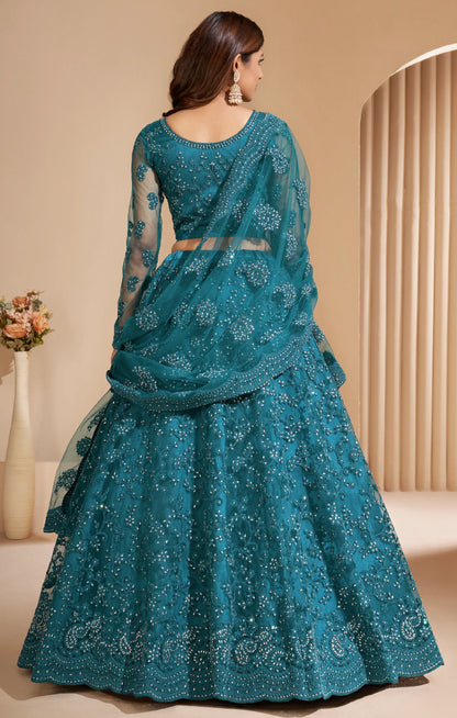 Elegant teal net lehenga with silk inner and thread &amp; cording embroidery.