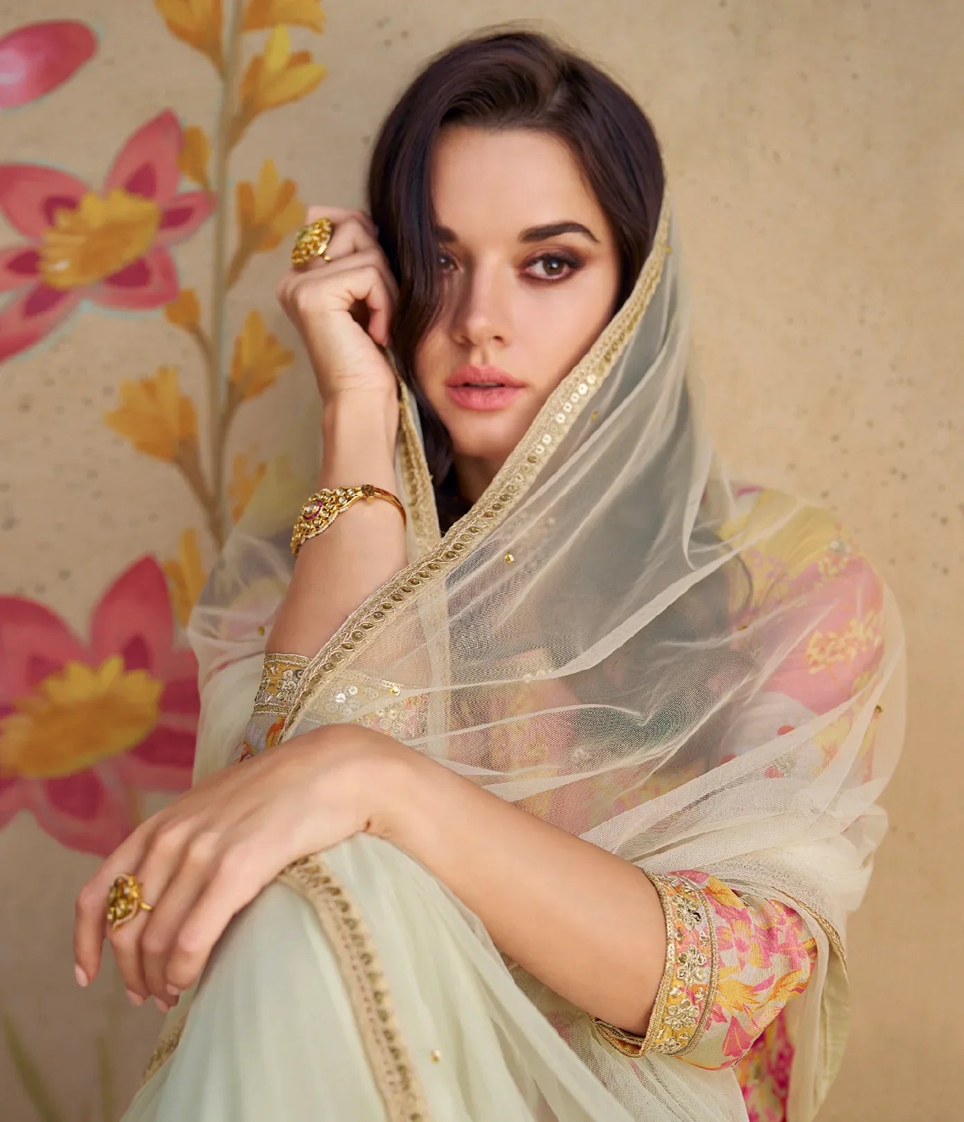 Pastel floral embroidered chinon silk sharara suit with net dupatta