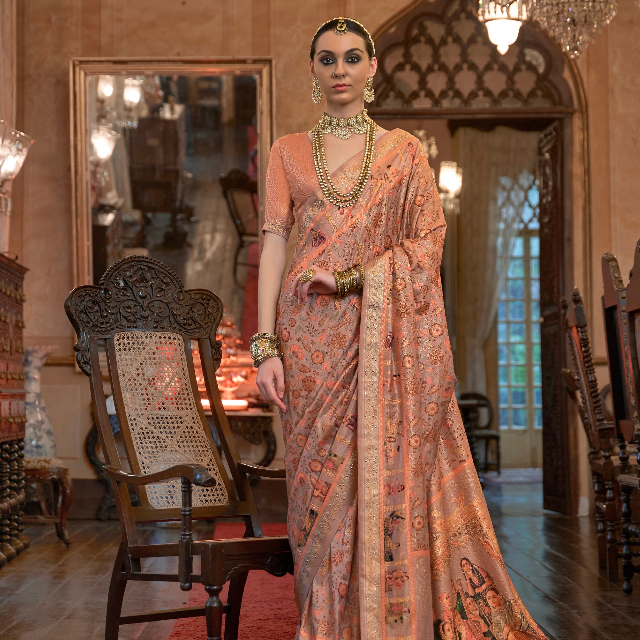 Peach Patola Silk Saree with Traditional Motifs and Handmade Tassels
