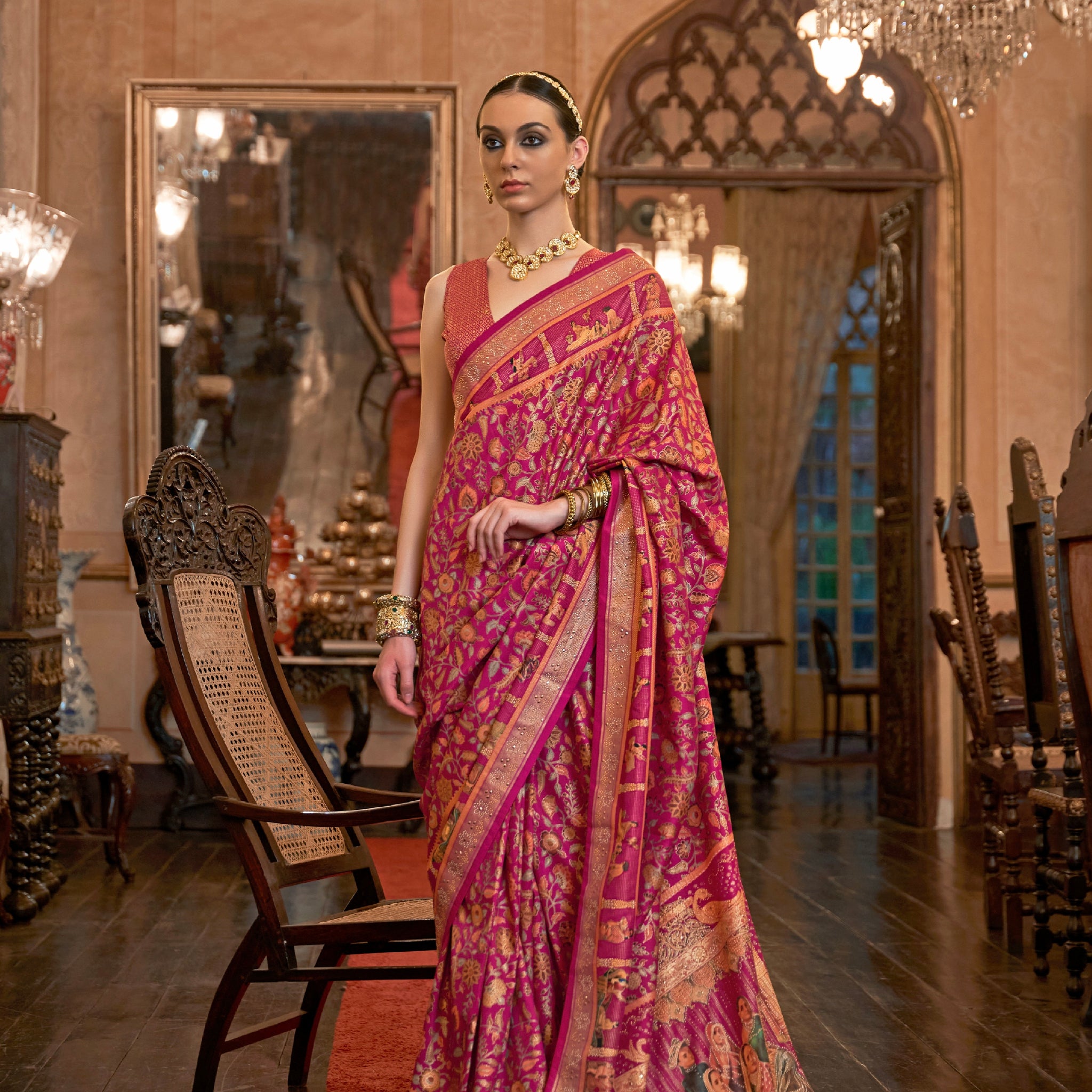 Pink Patola Silk Saree with Traditional Motifs and Handmade Tassels
