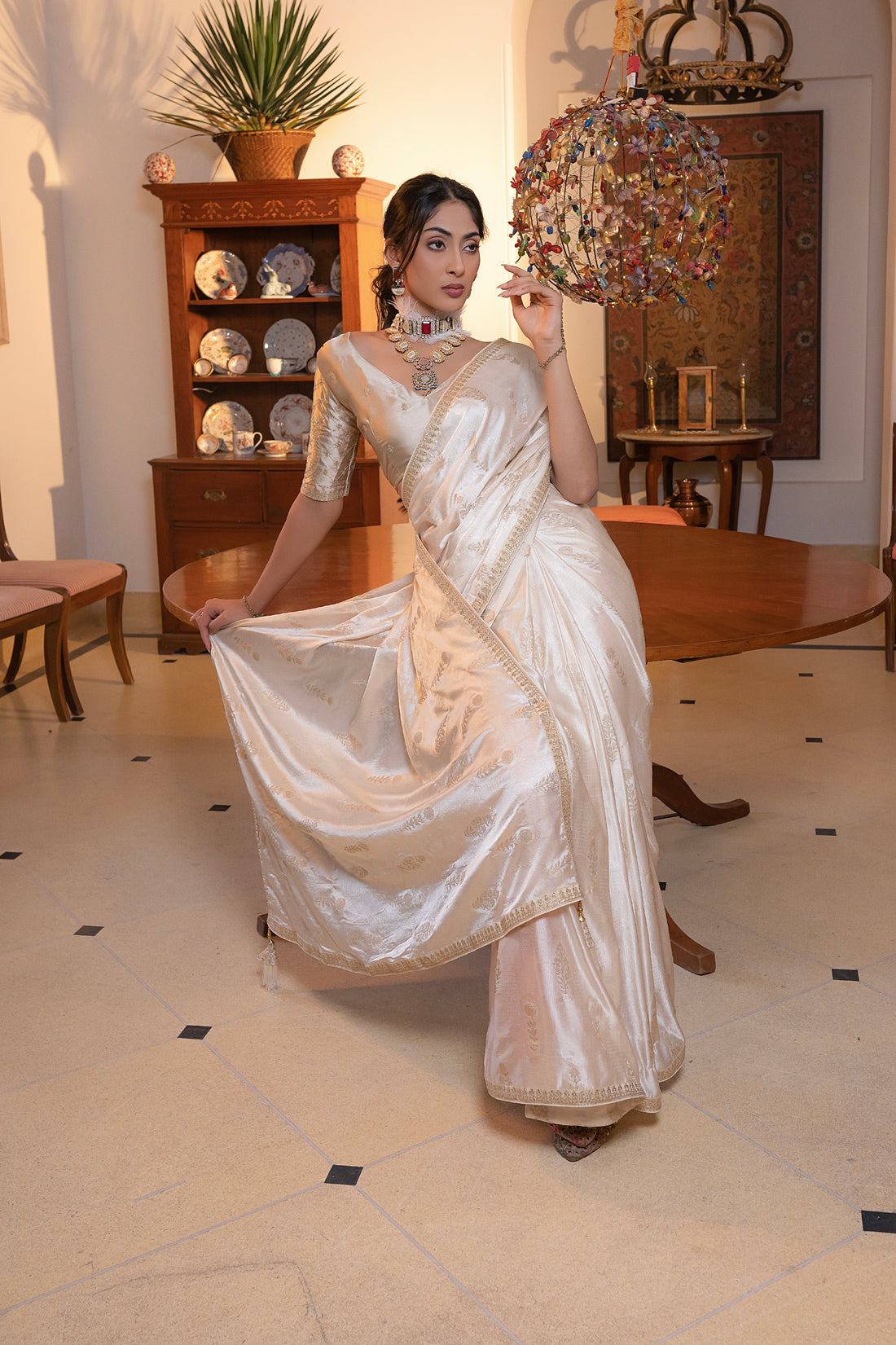 White Viscose Satin Silk Saree with Zari Motifs and Sequin Embroidery