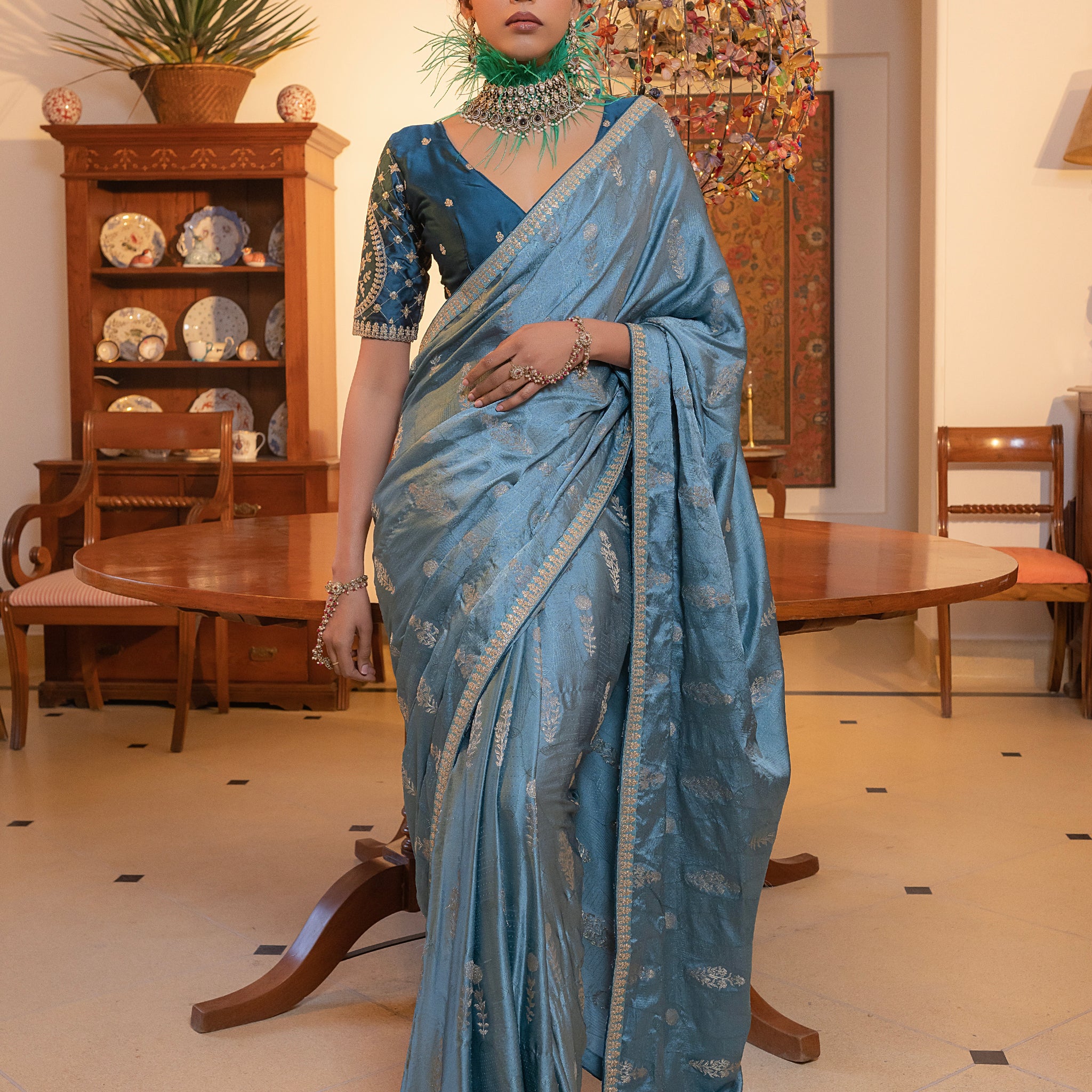 Sky Blue Viscose Satin Silk Saree with Zari Motifs and Sequin Embroidery