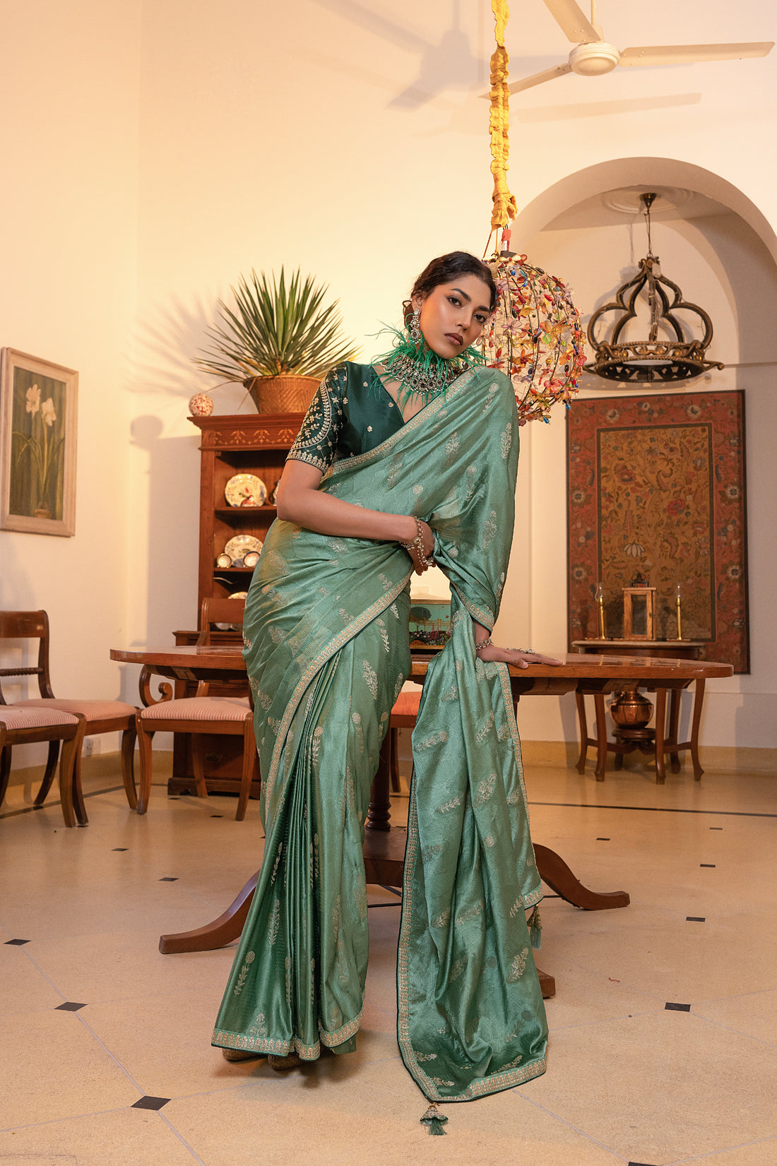 Sea Green Viscose Satin Silk Saree with Zari Motifs and Sequin Embroidery