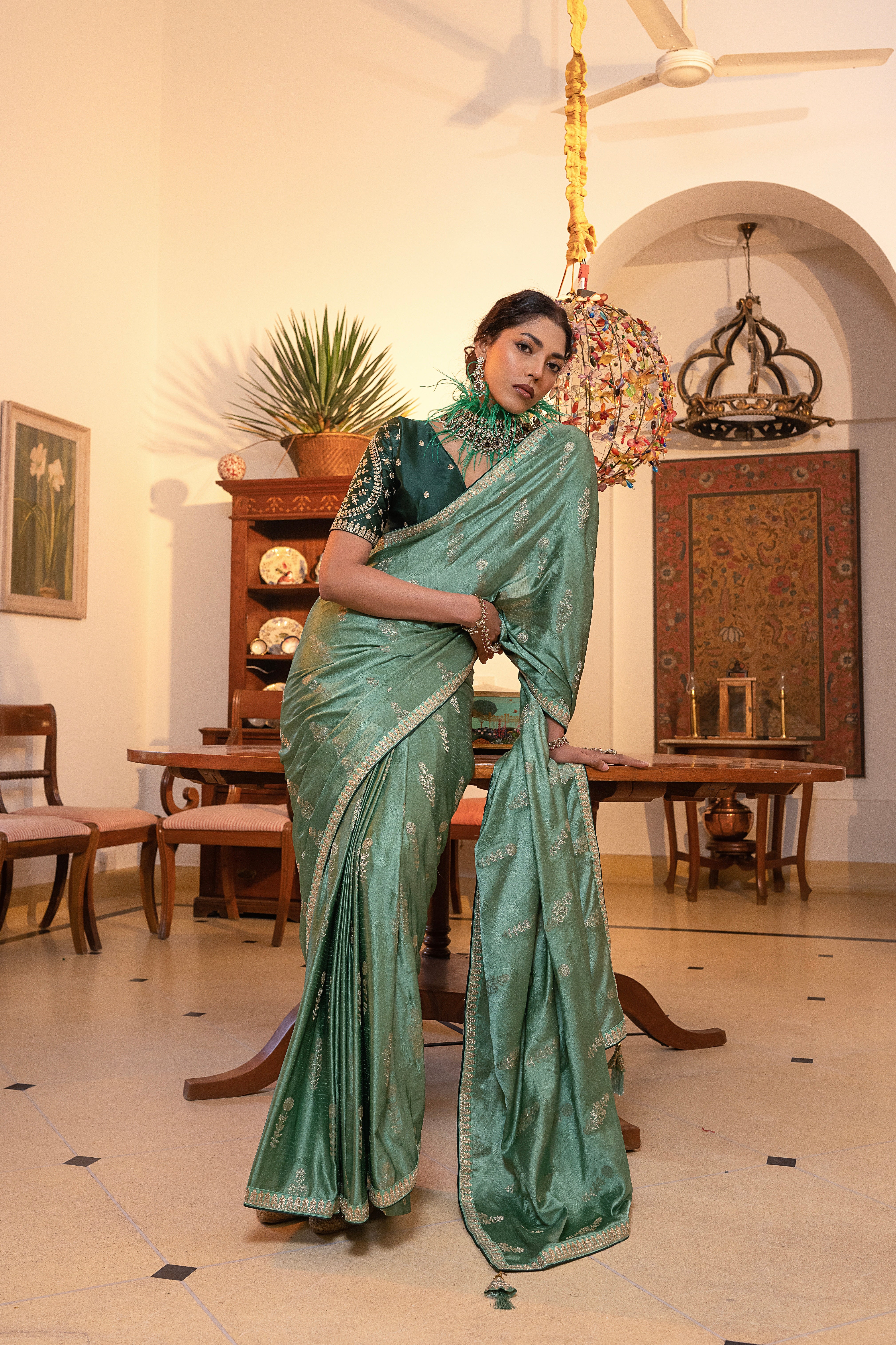 Sea Green Viscose Satin Silk Saree with Zari Motifs and Sequin Embroidery