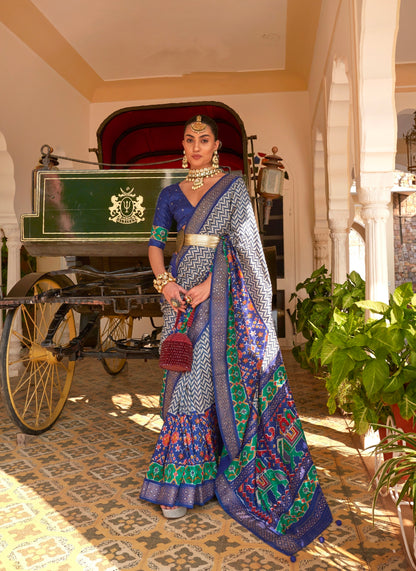 Blue &amp; Green Patola Silk Saree with Silver Border &amp; Elephant Pallu