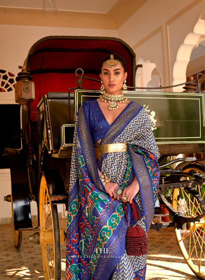 Blue &amp; Green Patola Silk Saree with Silver Border &amp; Elephant Pallu
