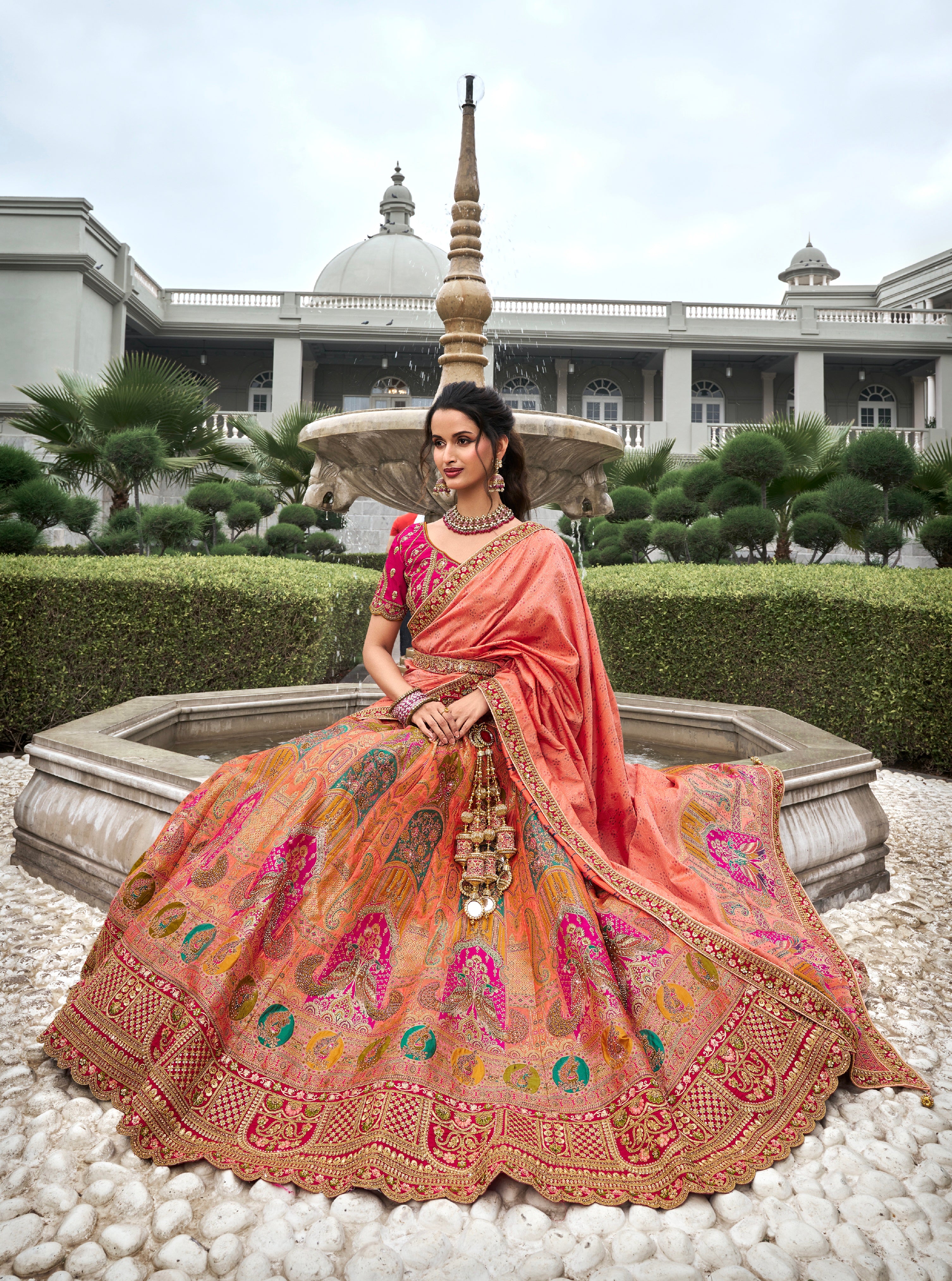 Peach &amp; Coral Banarasi Silk Lehenga Choli with Zarkan Codding Work