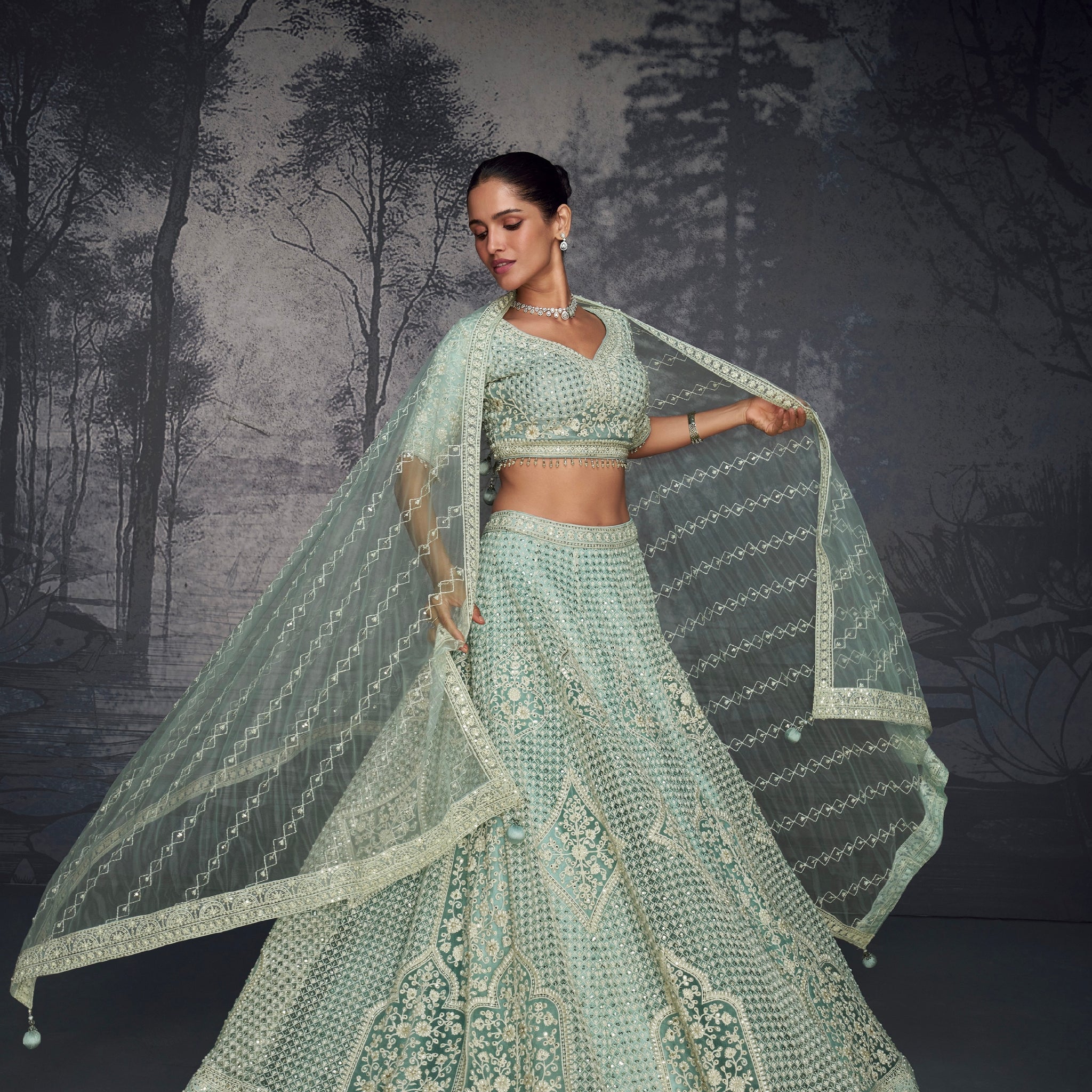 Mint Green Embroidered Net Lehenga with Handcrafted Diamonds