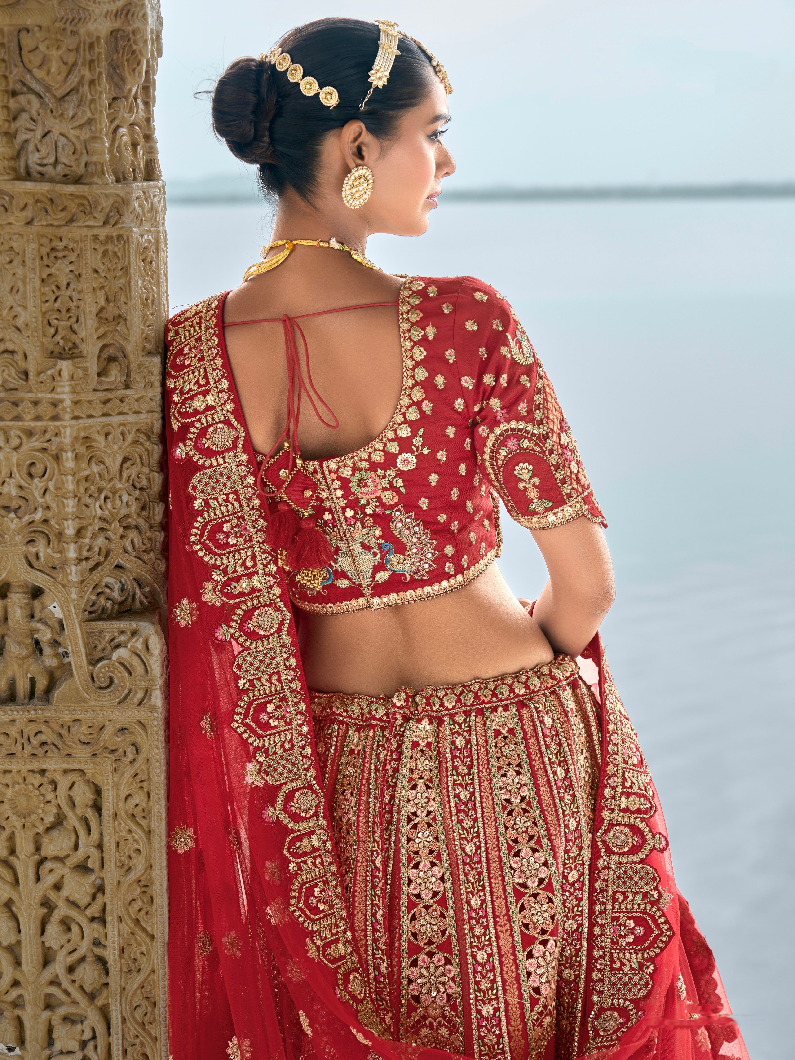 Red Bridal Lehenga with Royal Embroidery and Opulent Detailing