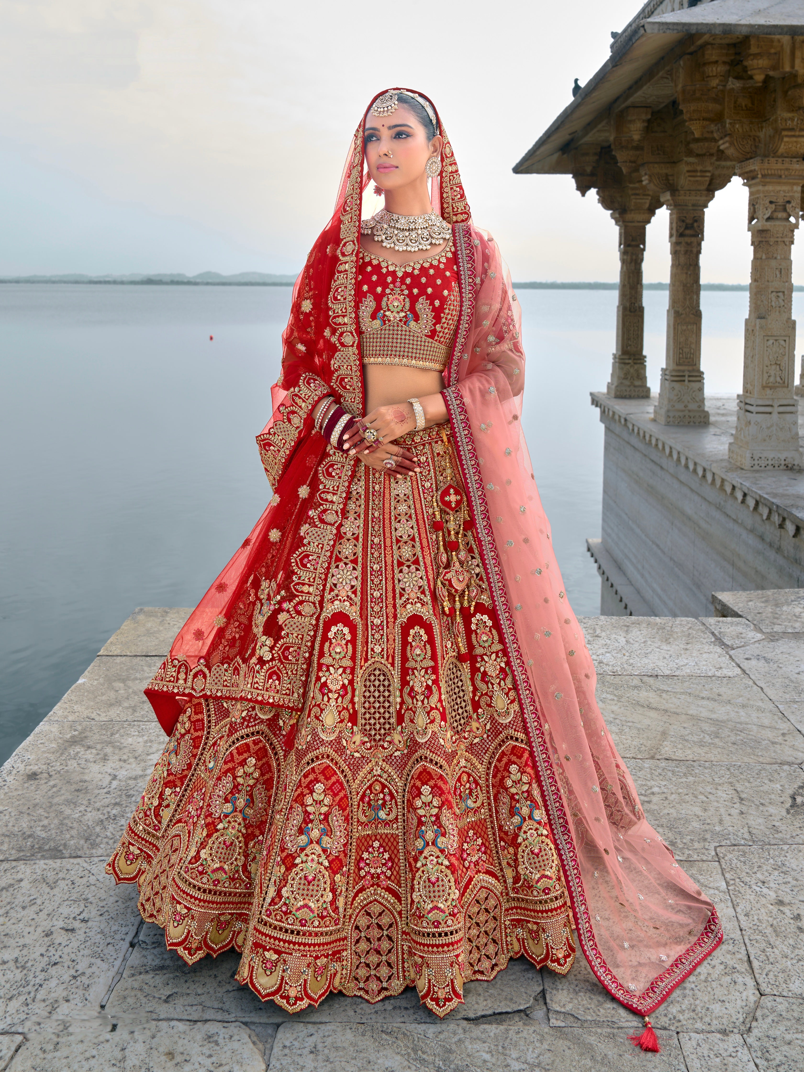 Red Bridal Lehenga with Royal Embroidery and Opulent Detailing
