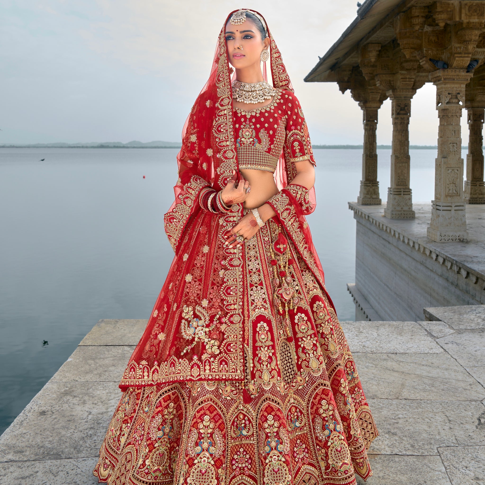 Red Bridal Lehenga with Royal Embroidery and Opulent Detailing