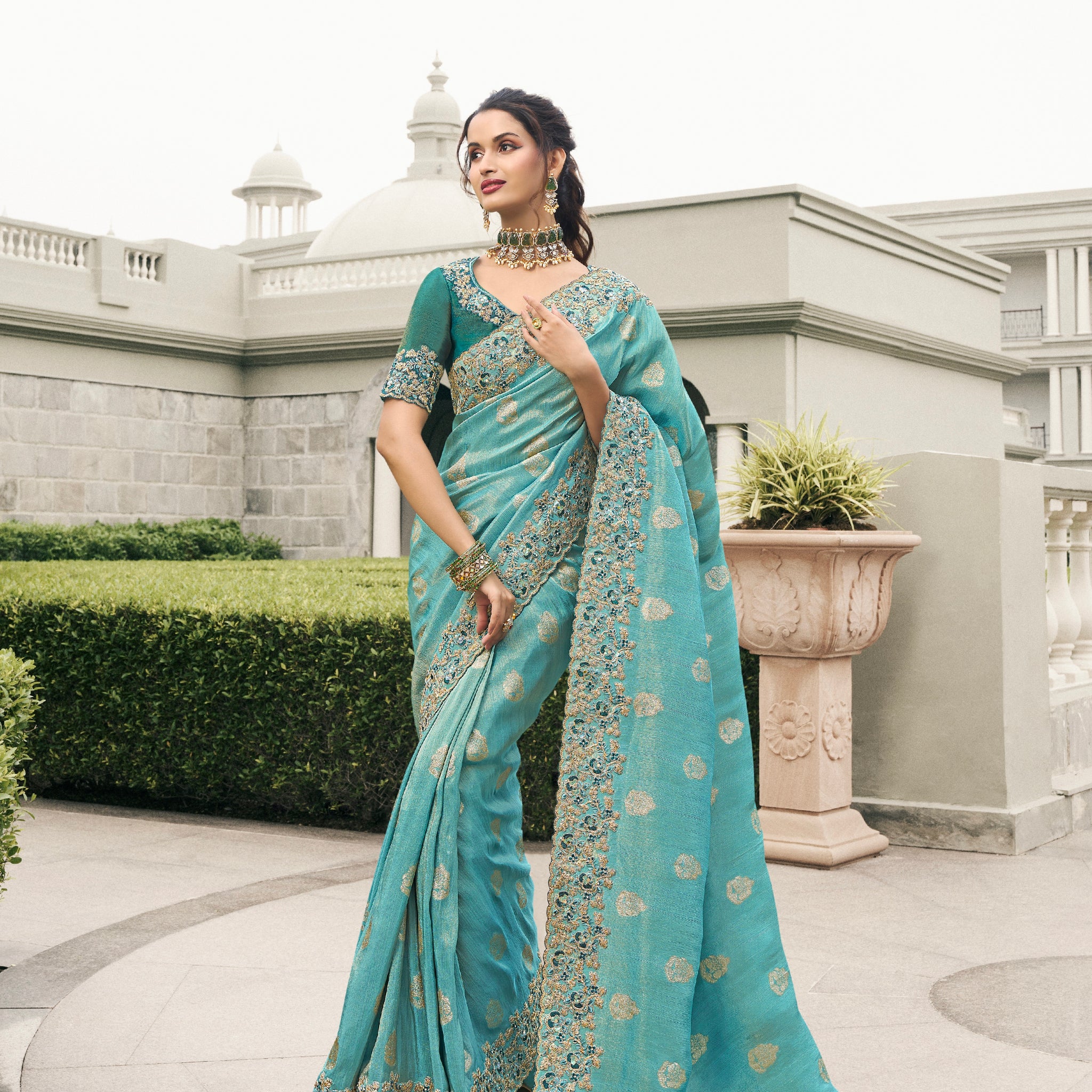Sky Blue Tissue Silk Saree with Embroidered Mirror Border