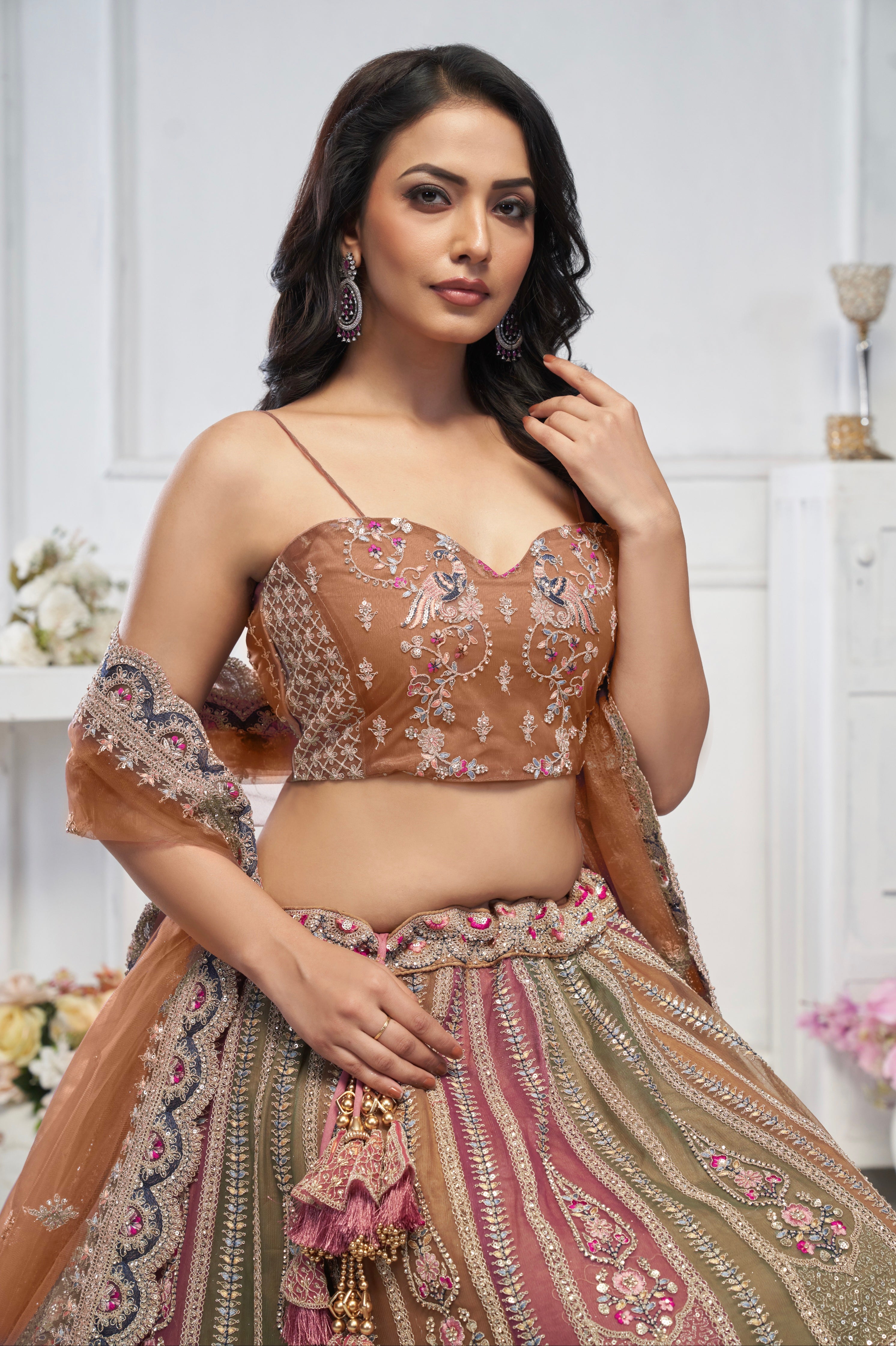 Multi-Brown Net Lehenga with Zari Weaving and Elephant Motifs