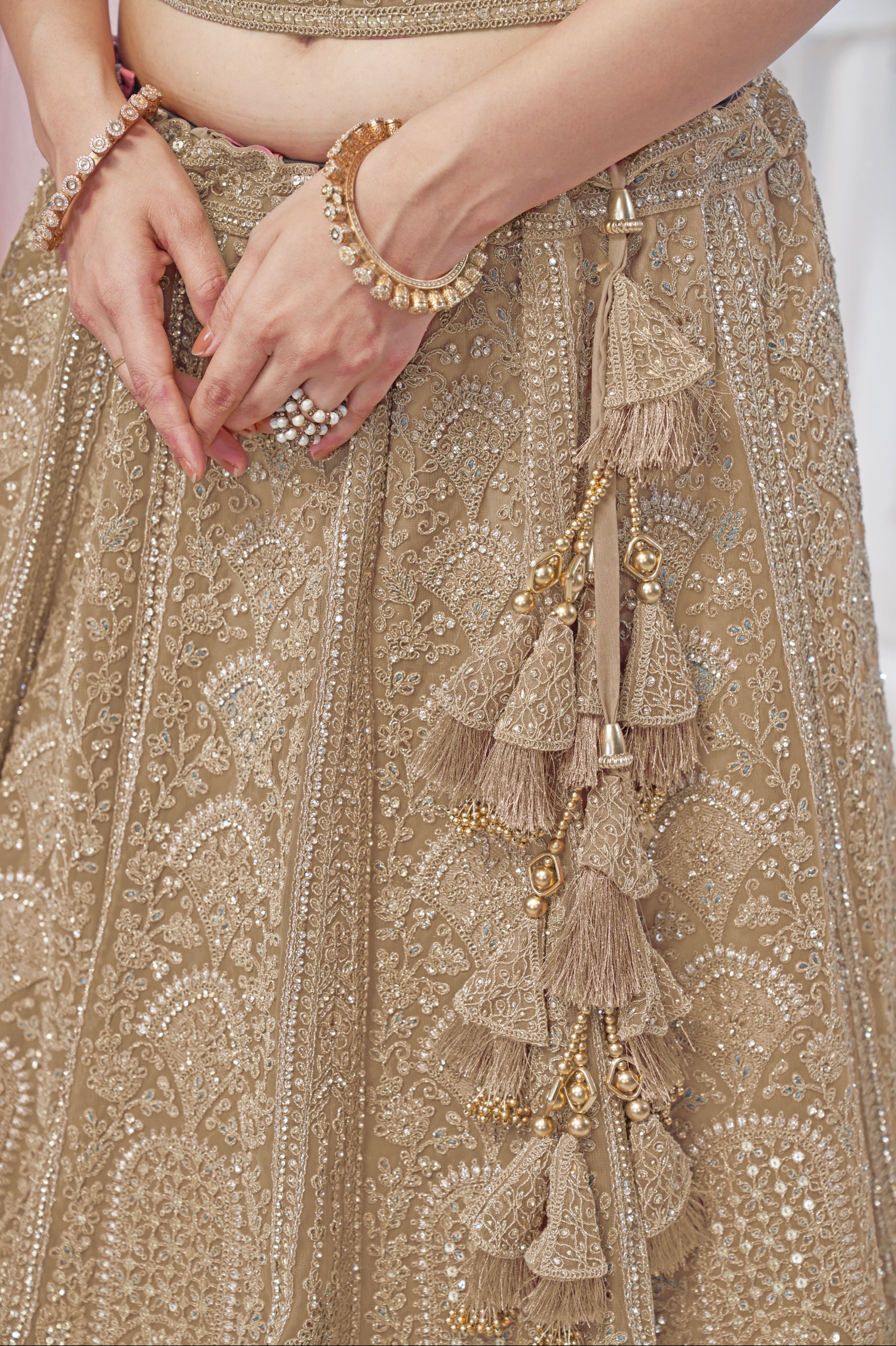 Golden Soft Net Lehenga with Sequins, Zari & Paisley Design
