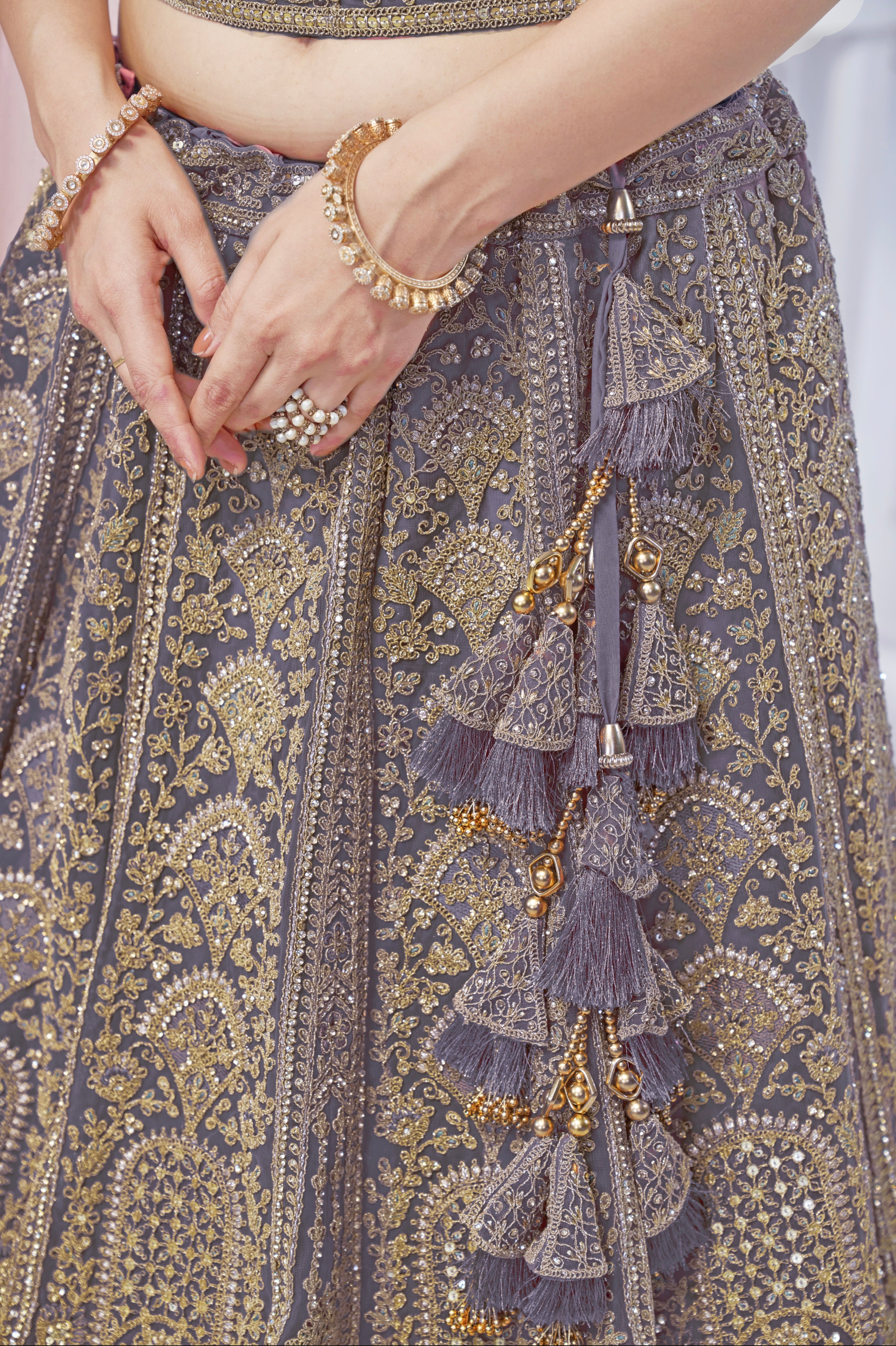 Purple Soft Net Lehenga with Sequins, Zari & Paisley Motifs