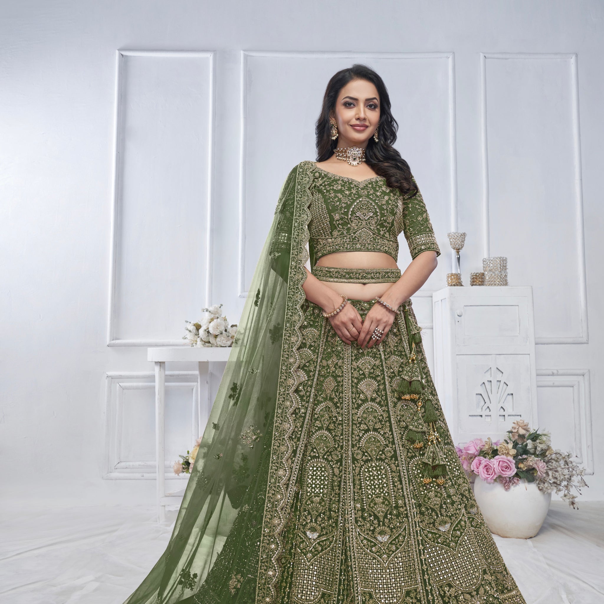 Green Soft Net Lehenga with Zari, Sequins & Paisley Design