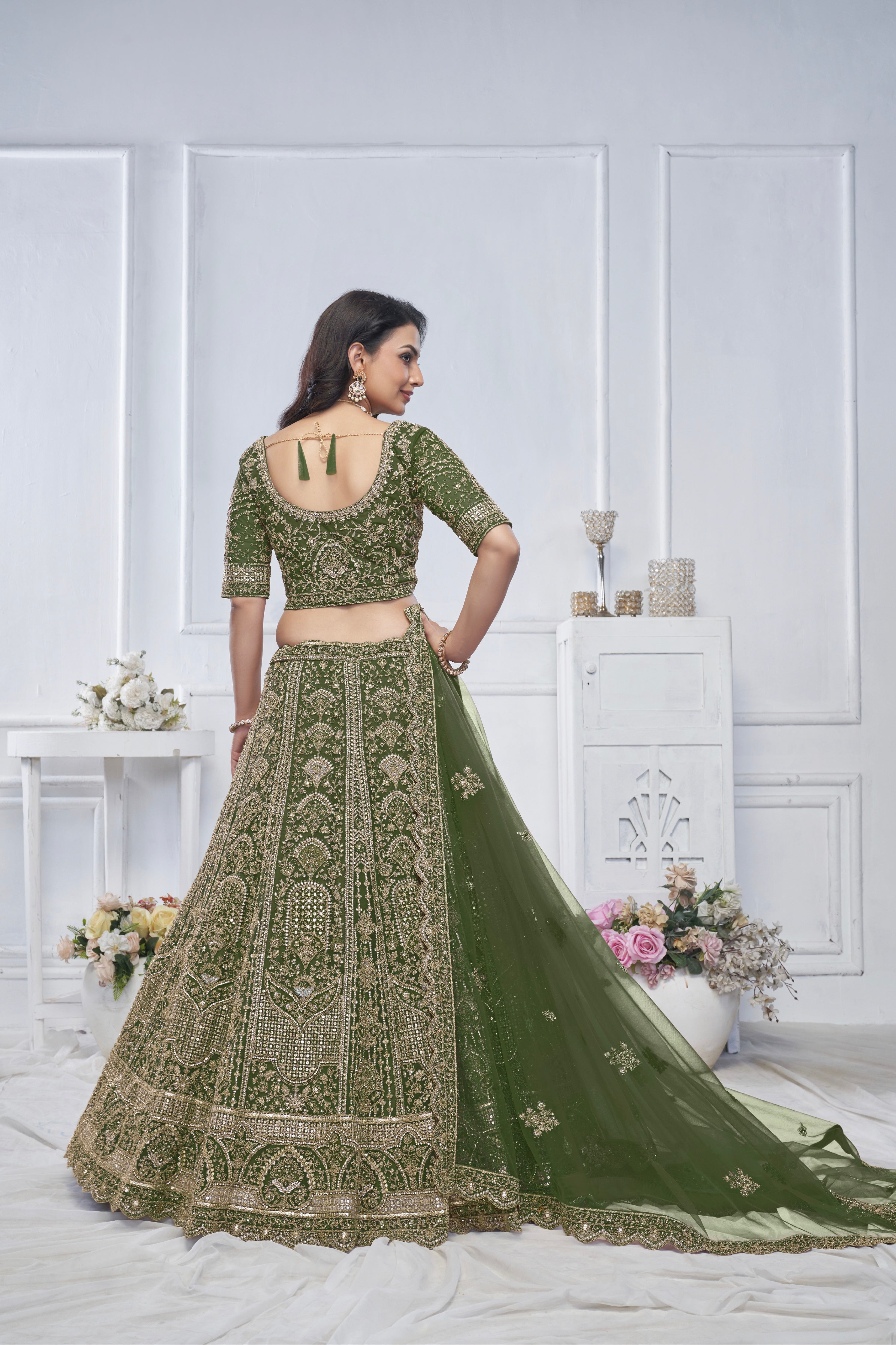 Green Soft Net Lehenga with Zari, Sequins & Paisley Design
