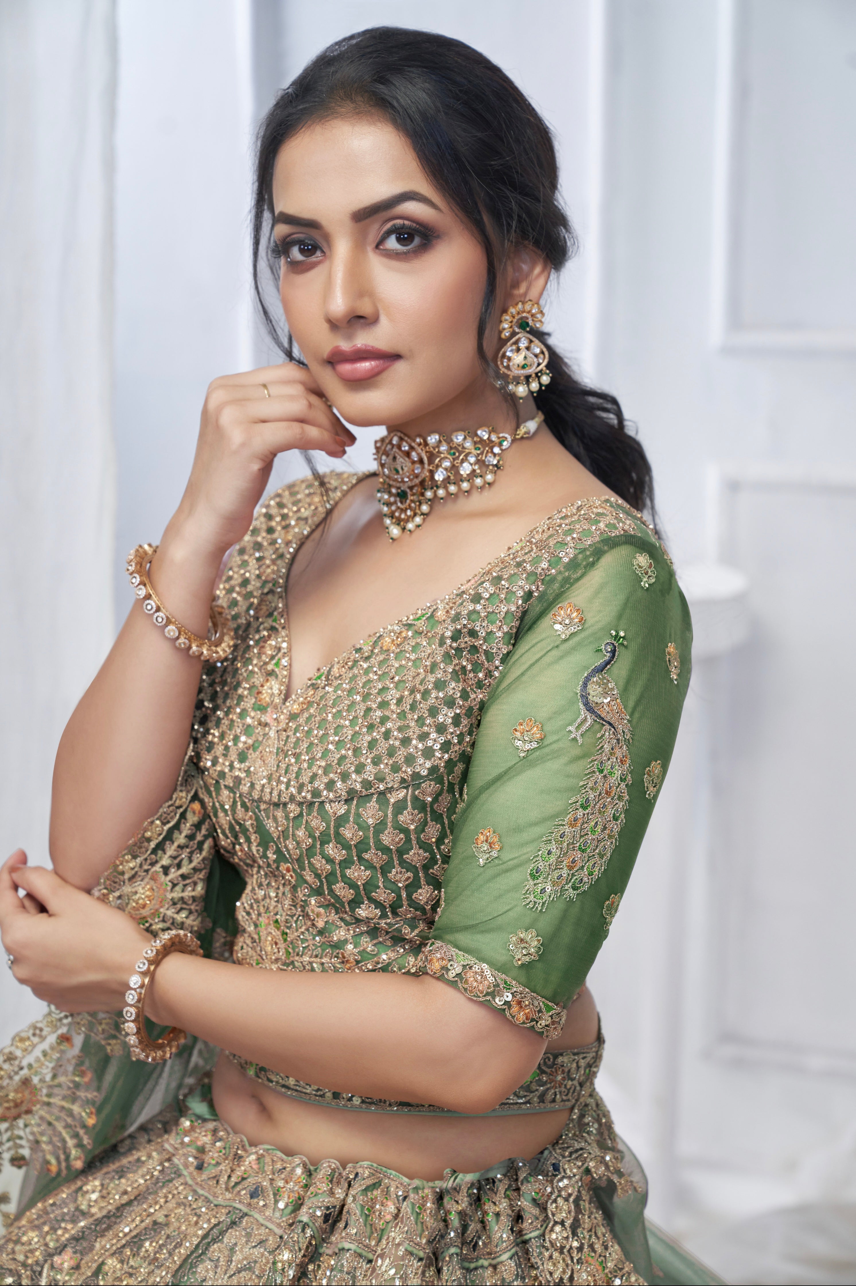 Green Soft Net Lehenga with Paisley &amp; Peacock Embroidery