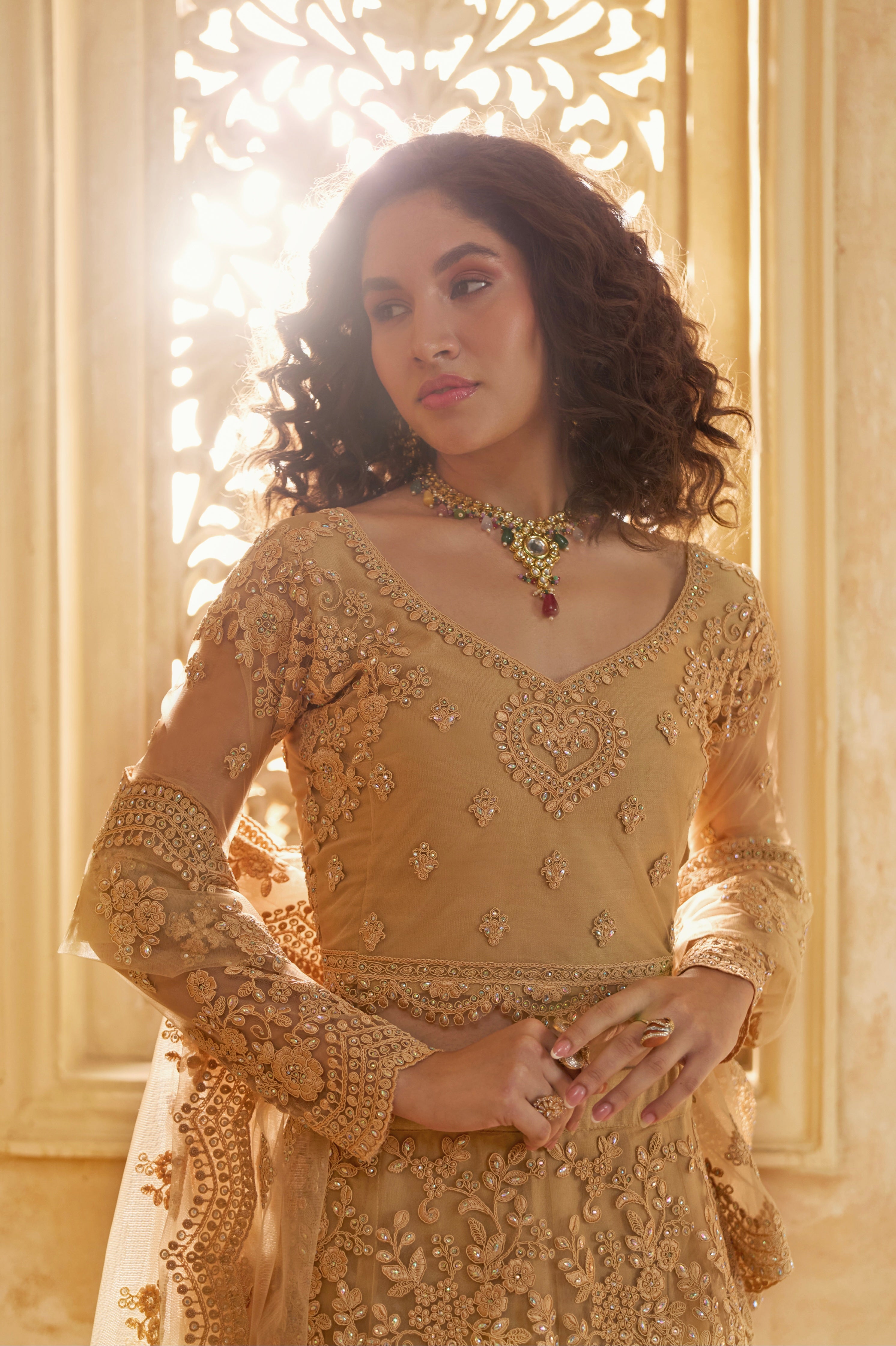 Golden Lehenga Choli with Intricate Stone &amp; Thread Embroidery
