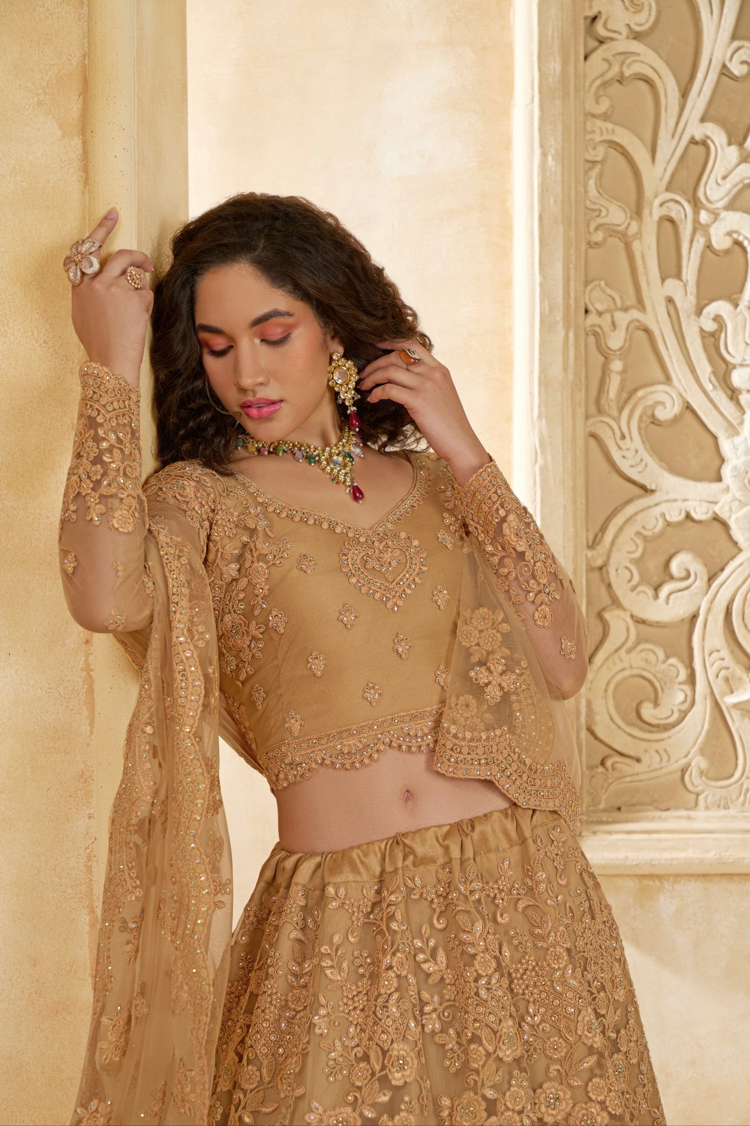 Golden Lehenga Choli with Intricate Stone &amp; Thread Embroidery