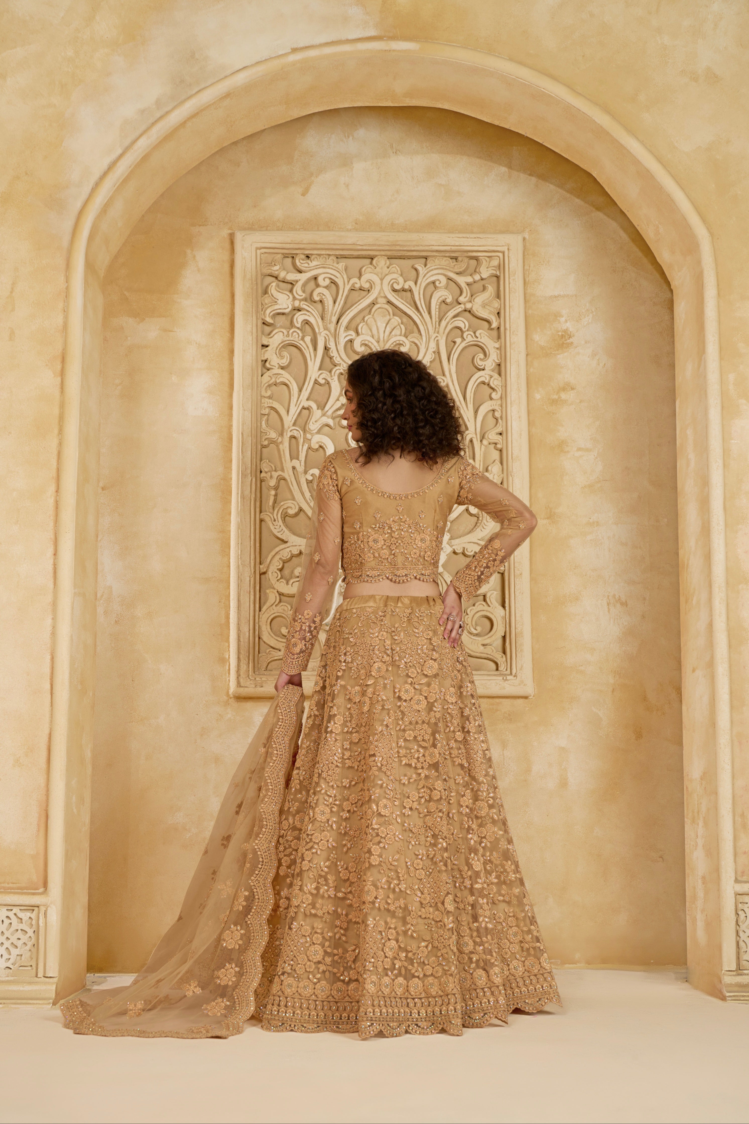 Golden Lehenga Choli with Intricate Stone &amp; Thread Embroidery