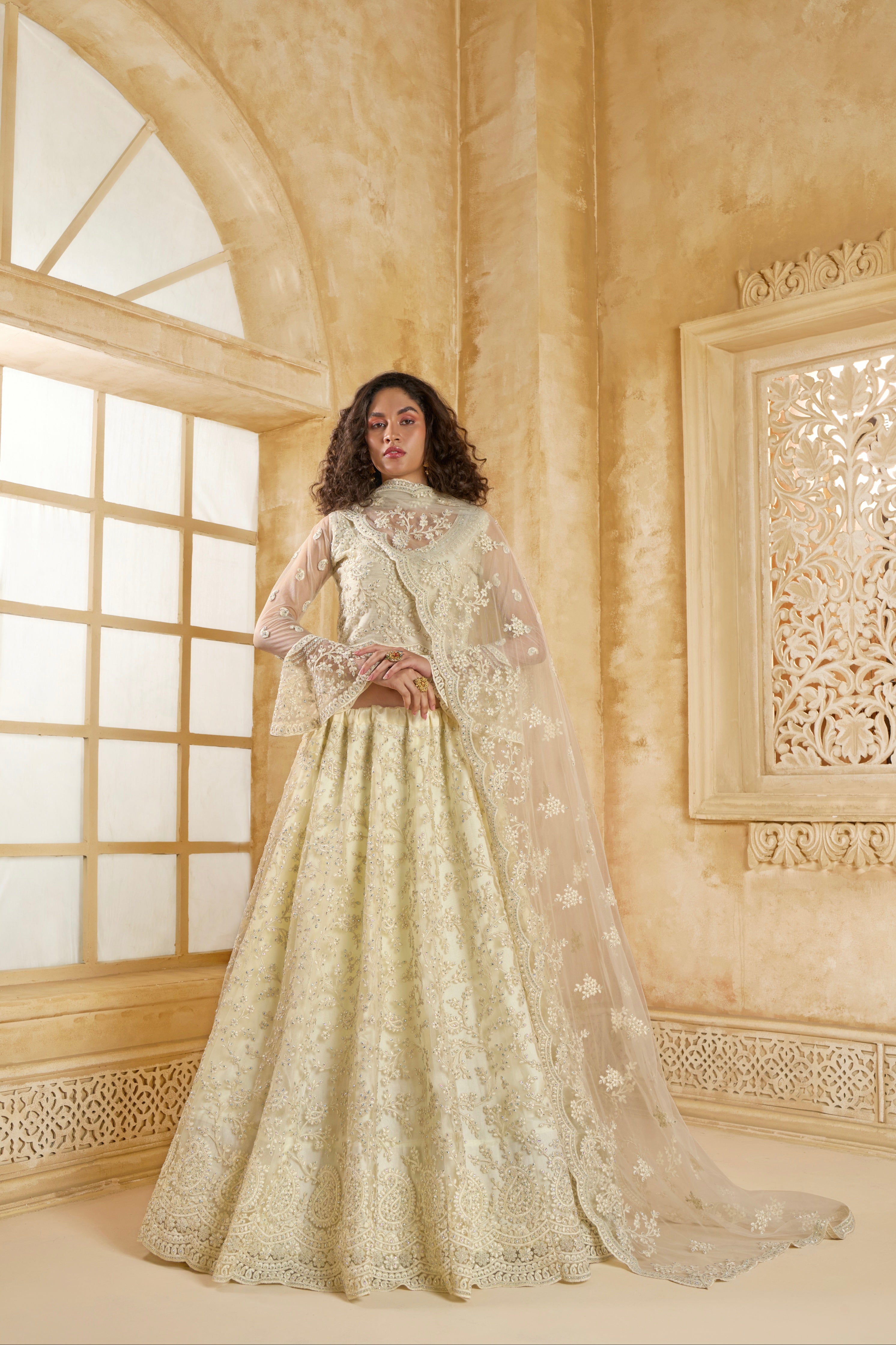 Ivory Net Bridal Lehenga Choli with All-Over Stone &amp; Thread Embroidery