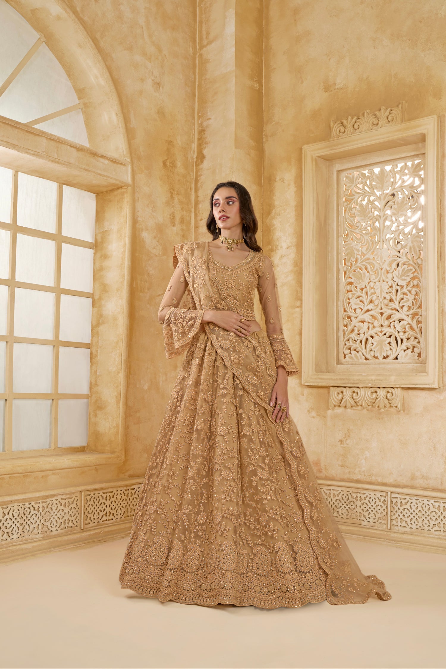 Golden Embellished Lehenga Choli with Intricate Threadwork &amp; Stones