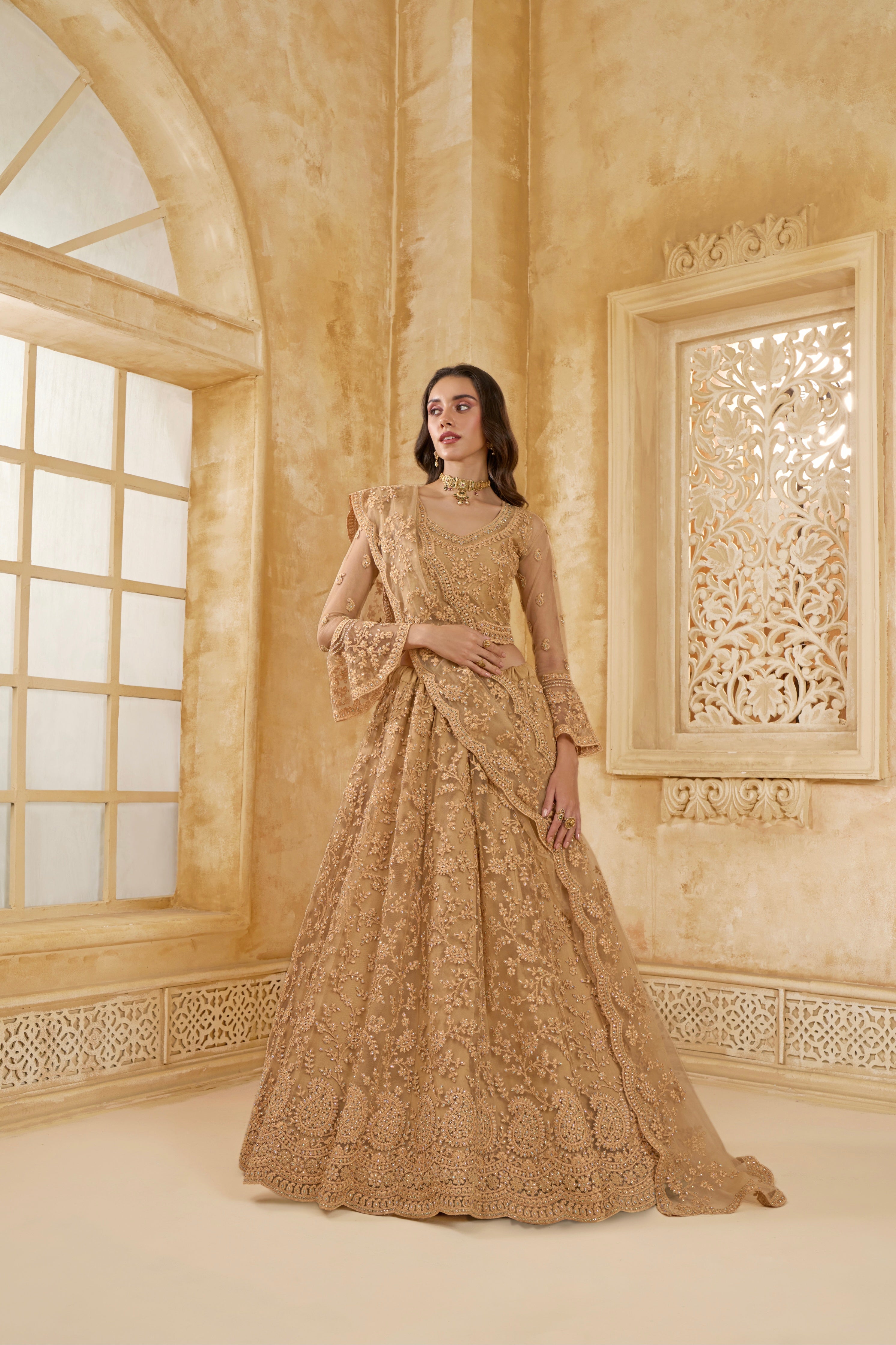 Golden Embellished Lehenga Choli with Intricate Threadwork &amp; Stones