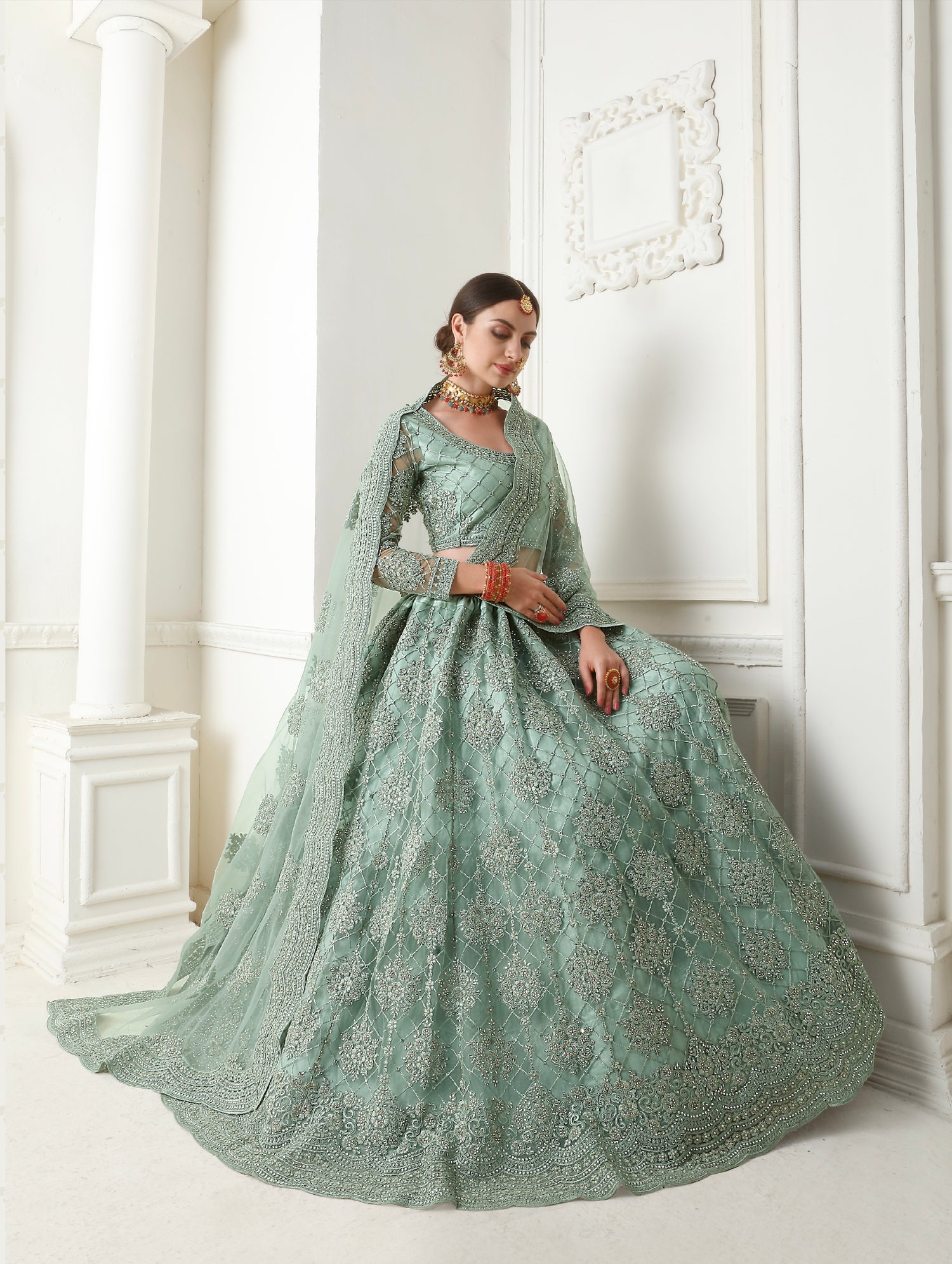 Mint Green Net Lehenga with Elegant Threadwork &amp; Stone Embellishments