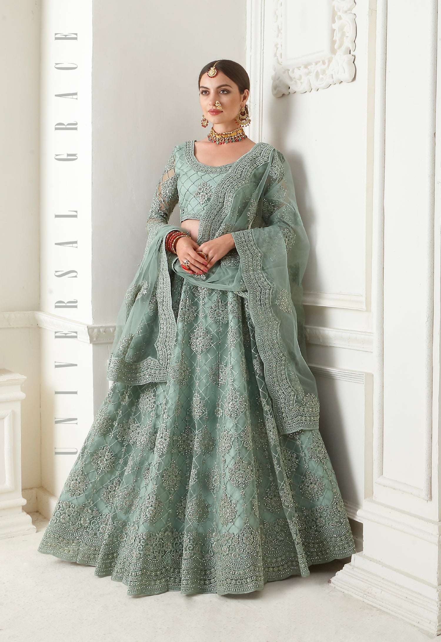Mint Green Net Lehenga with Elegant Threadwork &amp; Stone Embellishments