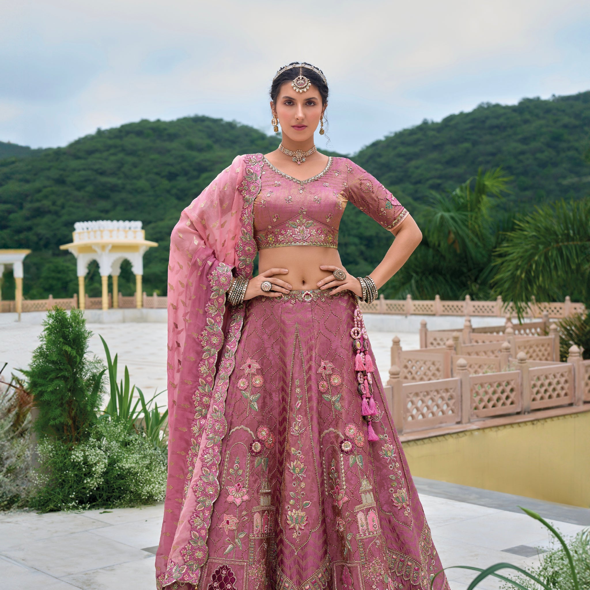 Plum Purple Embroidered Bridal Lehenga Choli with Pink Dupatta