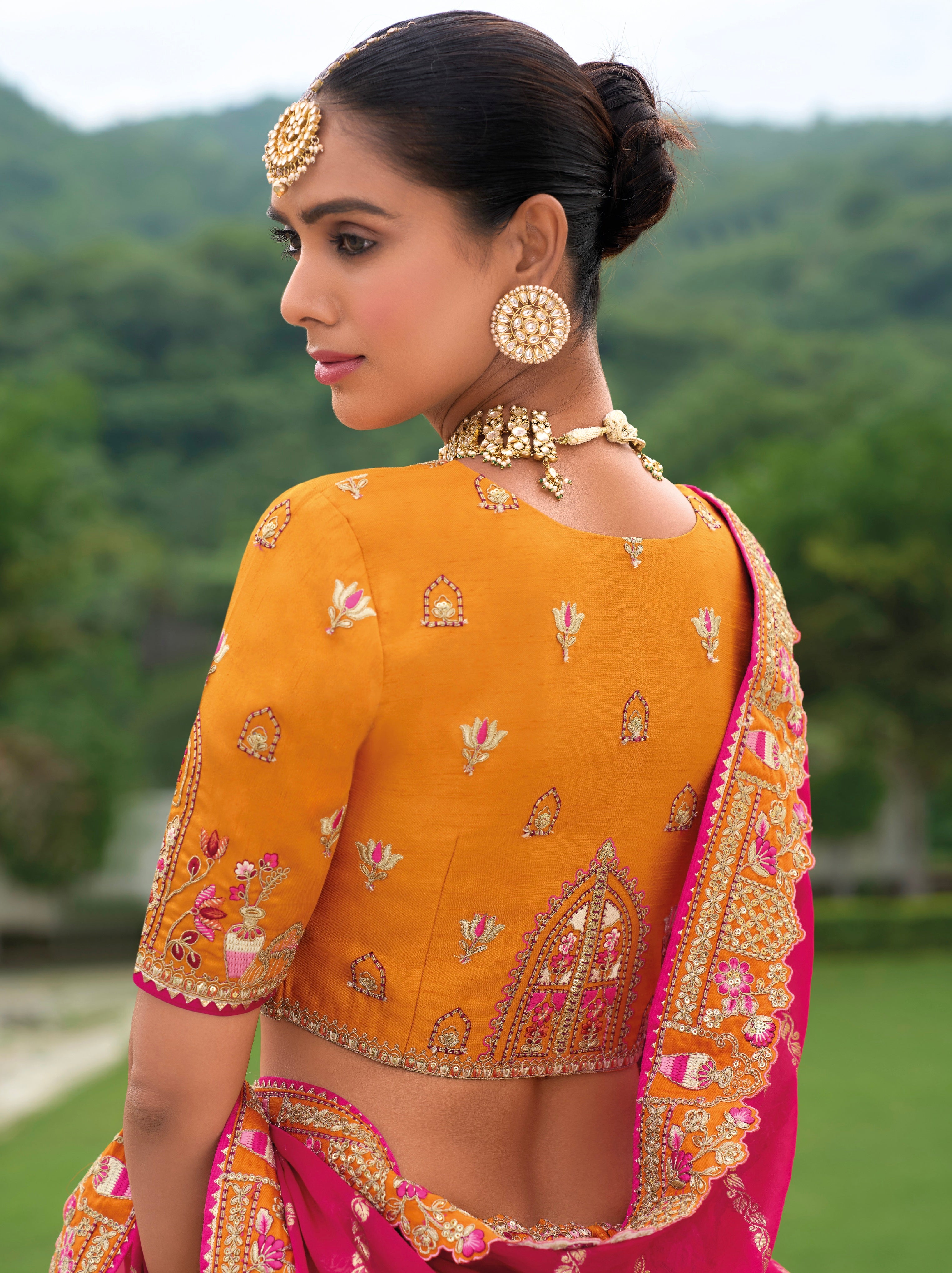 Mustard Yellow and Pink Lehenga with Traditional Patterns