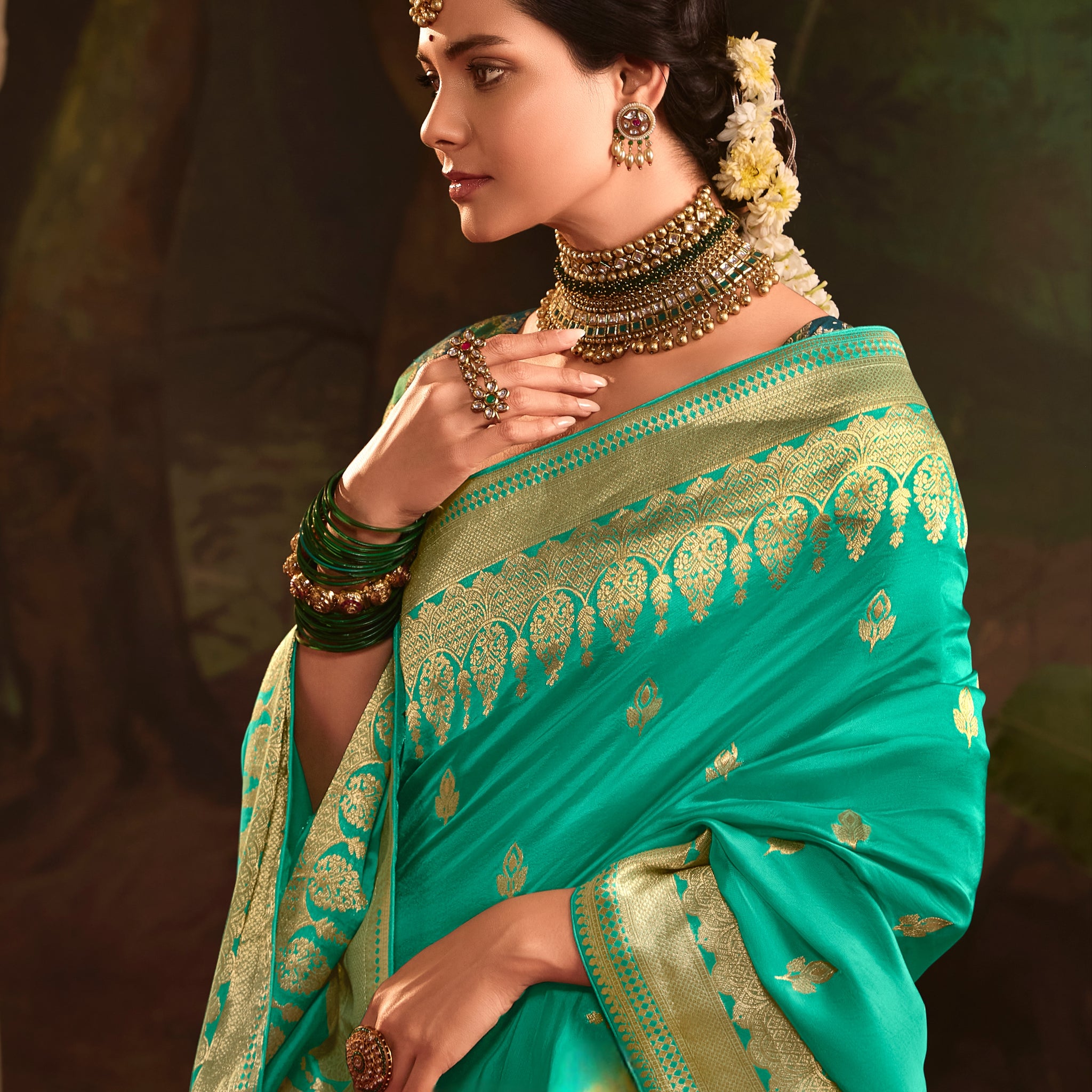 Aqua Blue Crepe Dola Silk Designer Saree with Heavy Zari Weaving