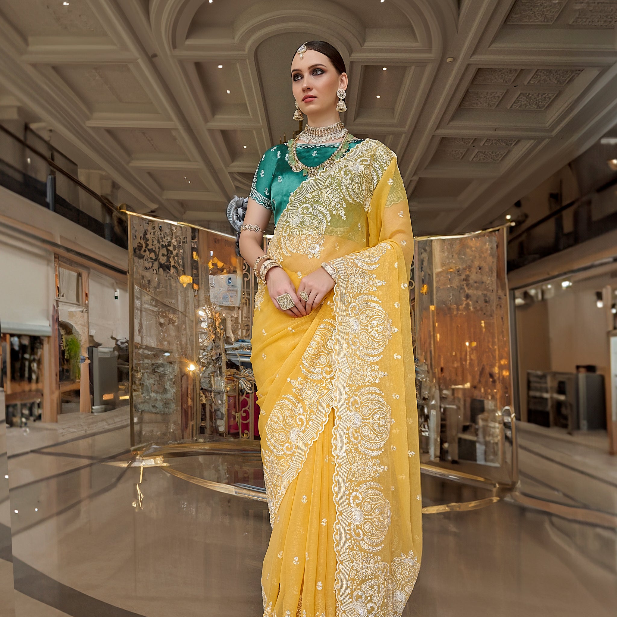 Yellow Fancy Tissue Saree with White Embroidery