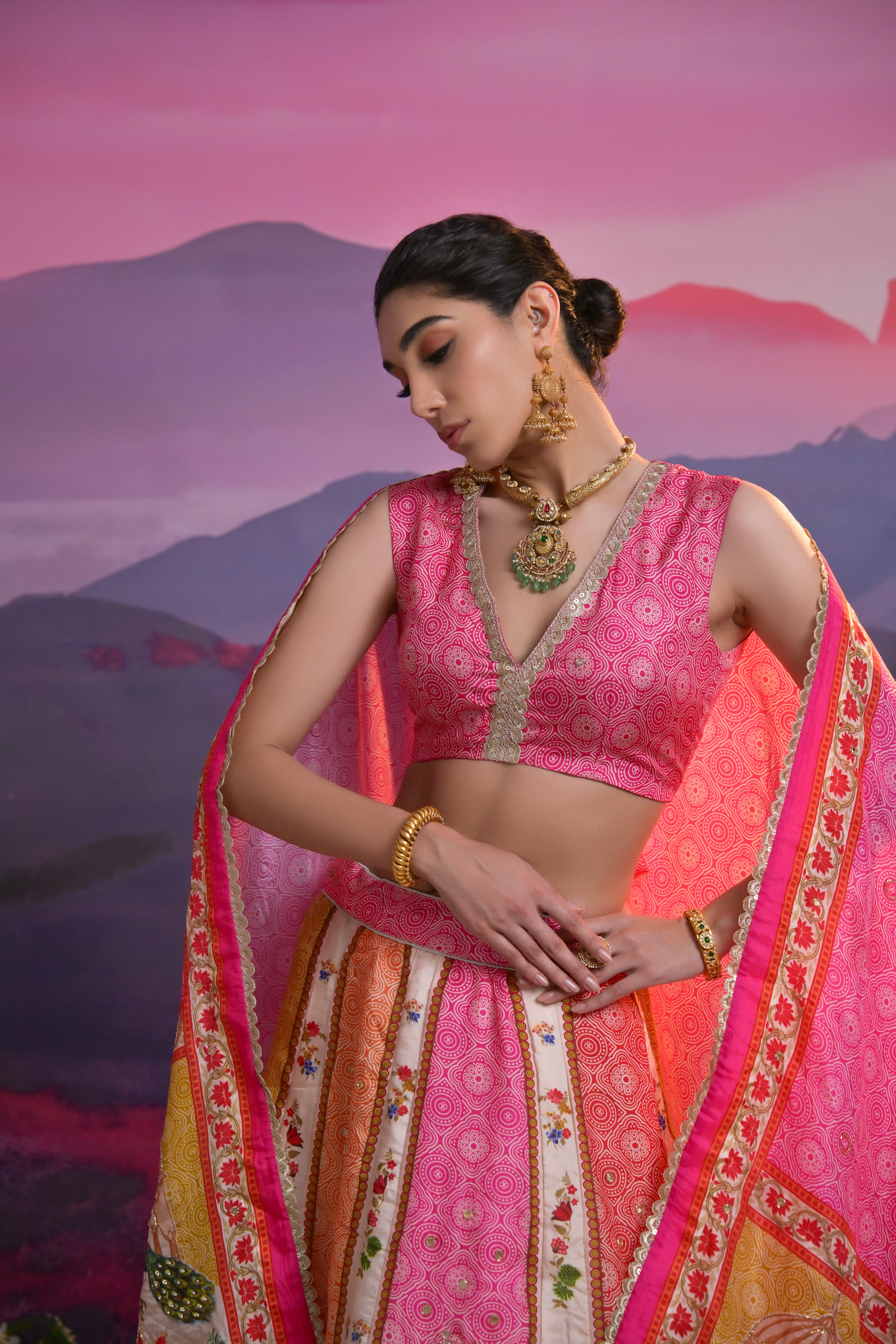 Pink &amp; Peach Bridal Lehenga with Peacock &amp; Palace Design