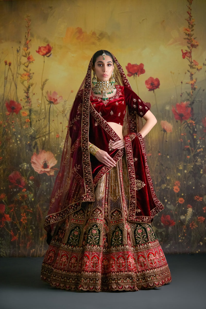 Deep Wine & Gold Velvet Bridal Lehenga with intricate zardosi work and matching embroidered dupatta
