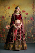 Designer Burgundy Bridal Lehenga with antique gold thread and hand embroidery