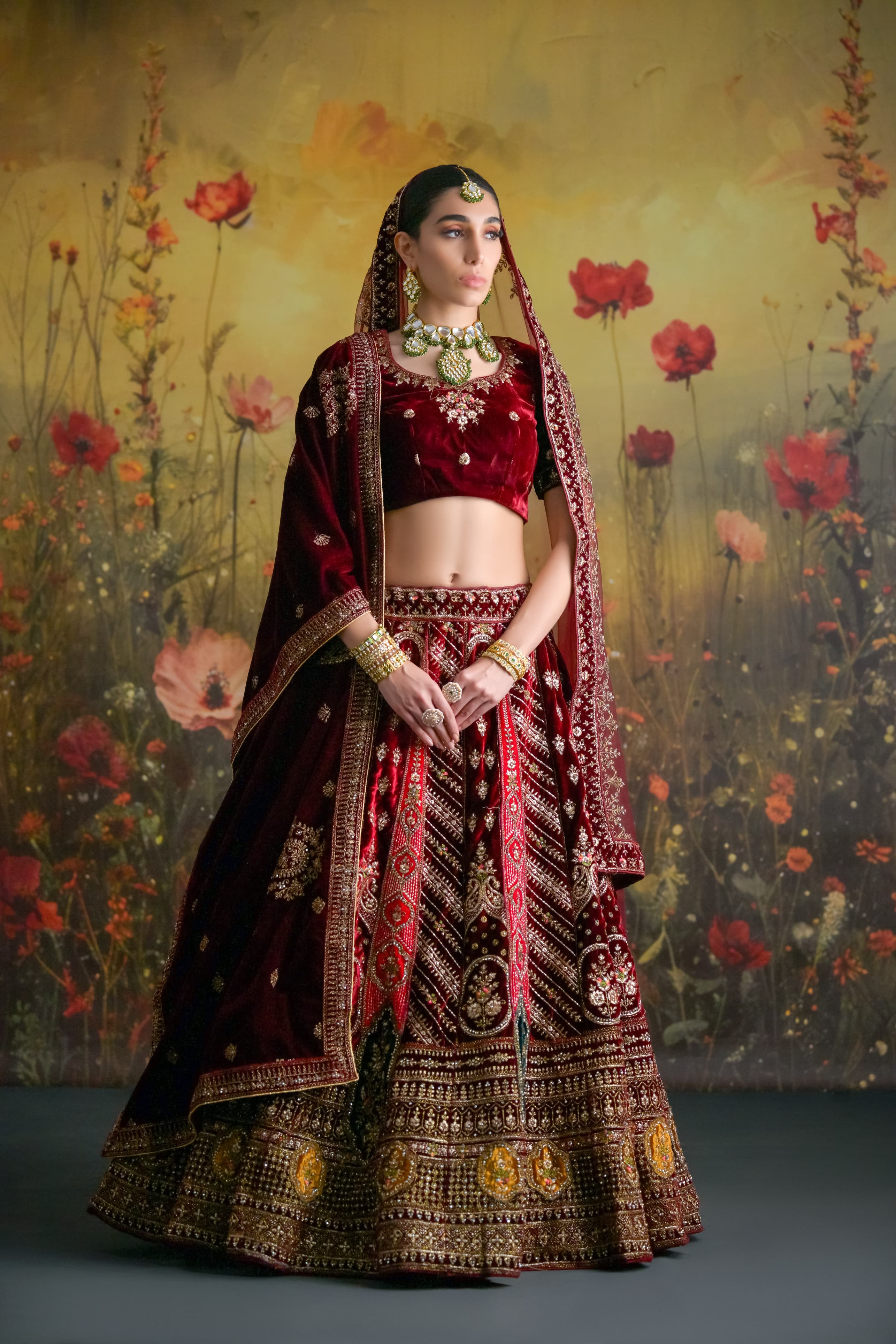 Designer Burgundy Bridal Lehenga with antique gold thread and hand embroidery