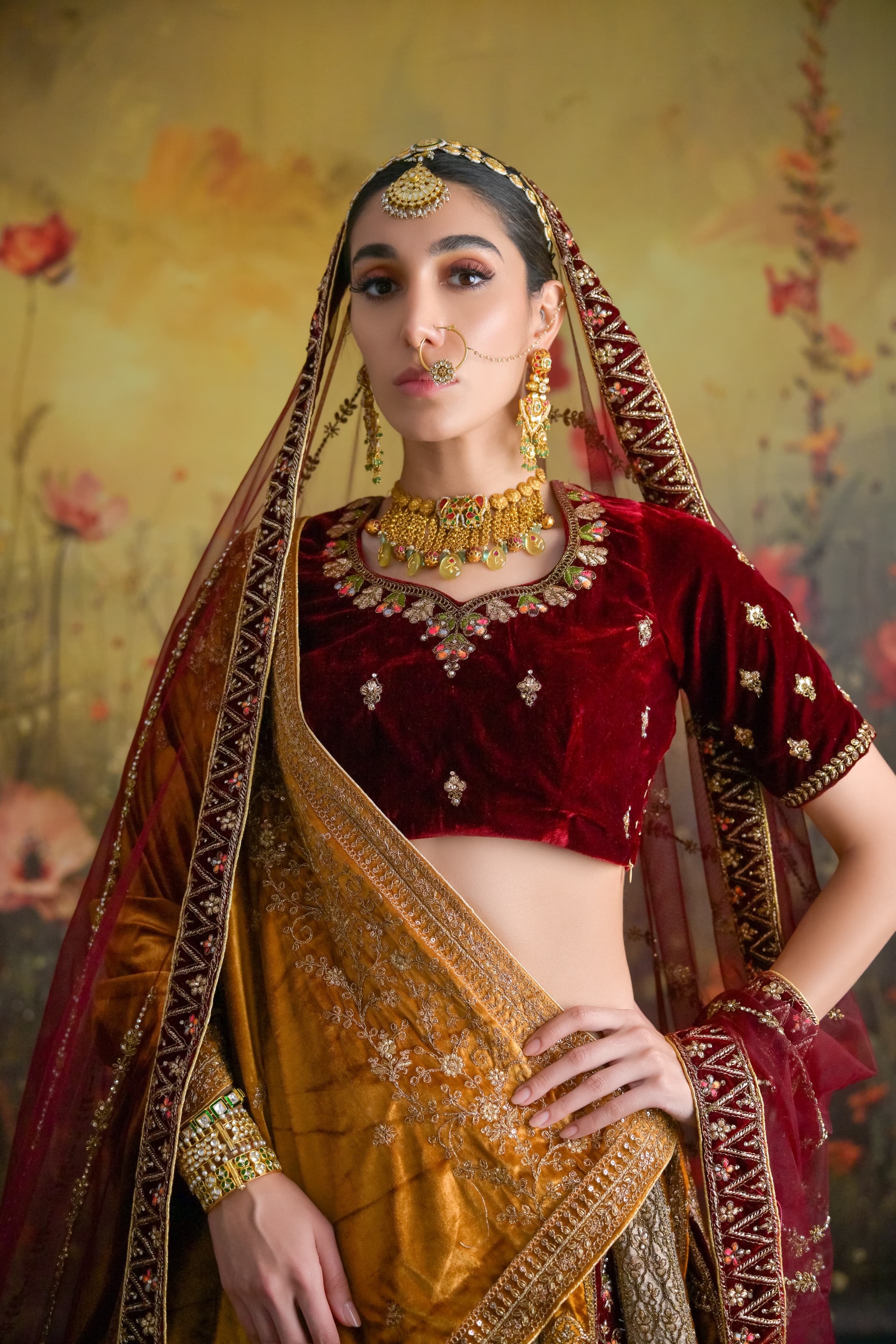 Luxurious bridal lehenga in brown and mustard velvet with hand-crafted Zardosi detailing 