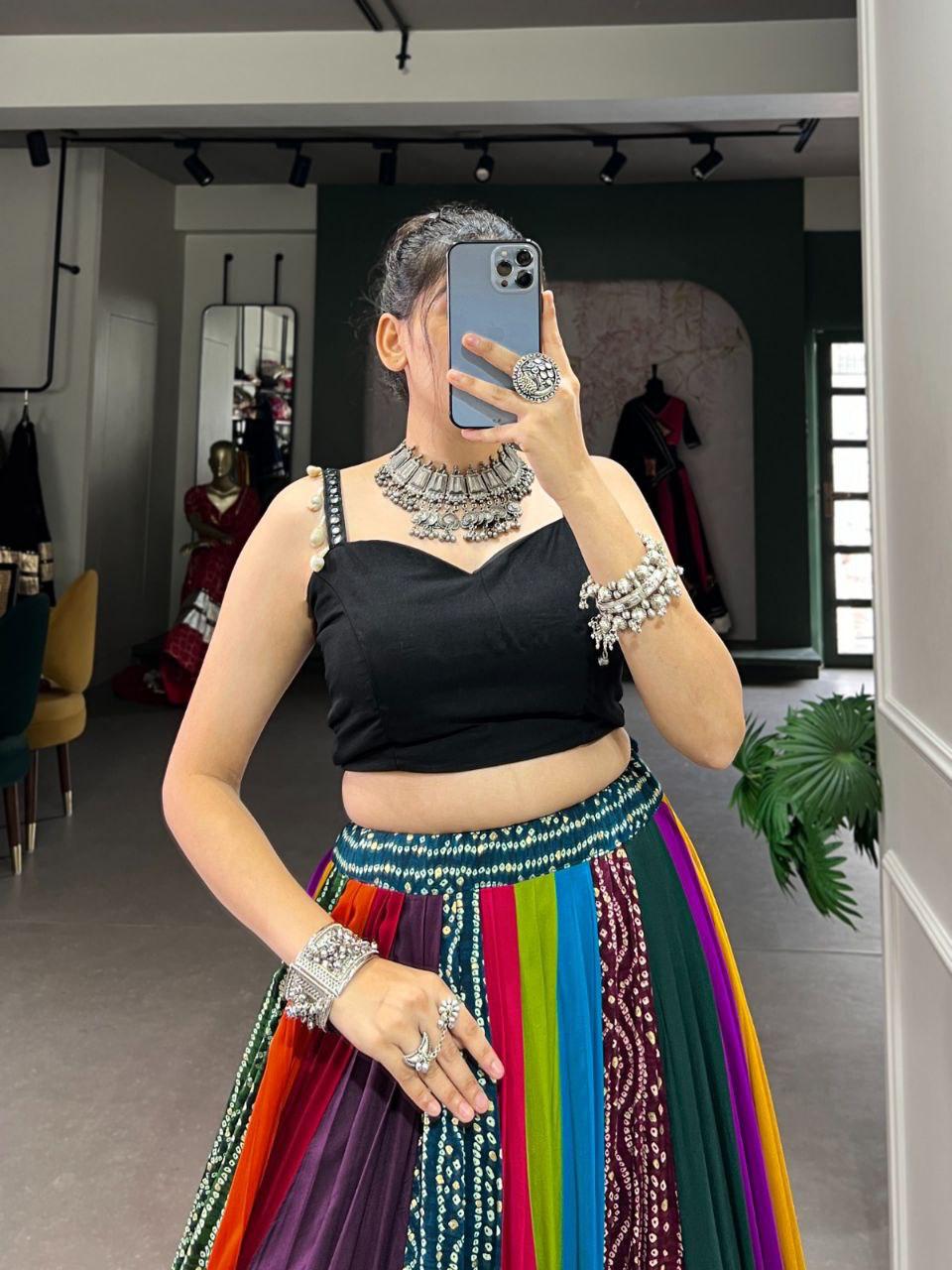 Get readymade Navratri lehenga choli sets in vibrant colors & mirror work.