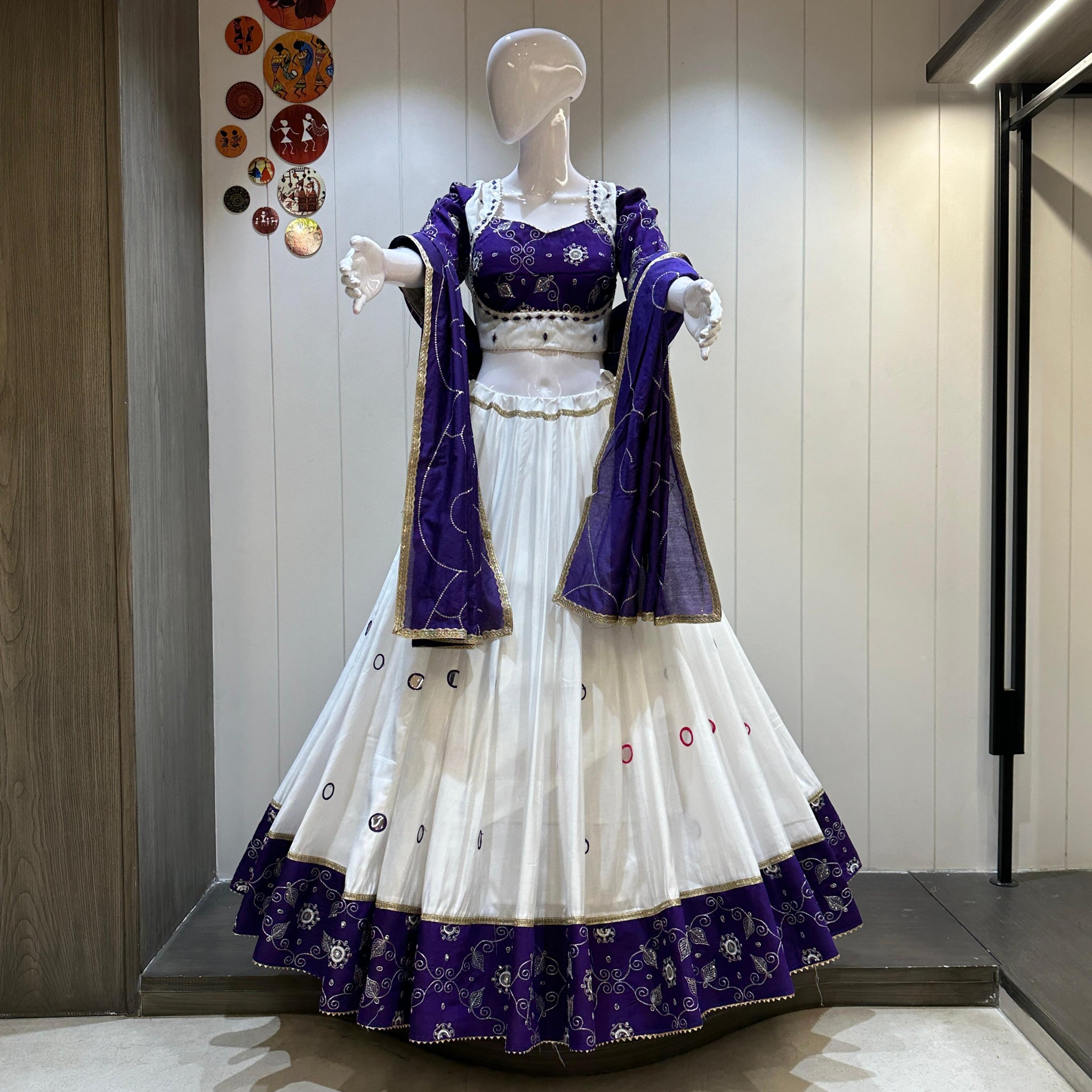 White chaniya choli with blue dupatta for Navratri 