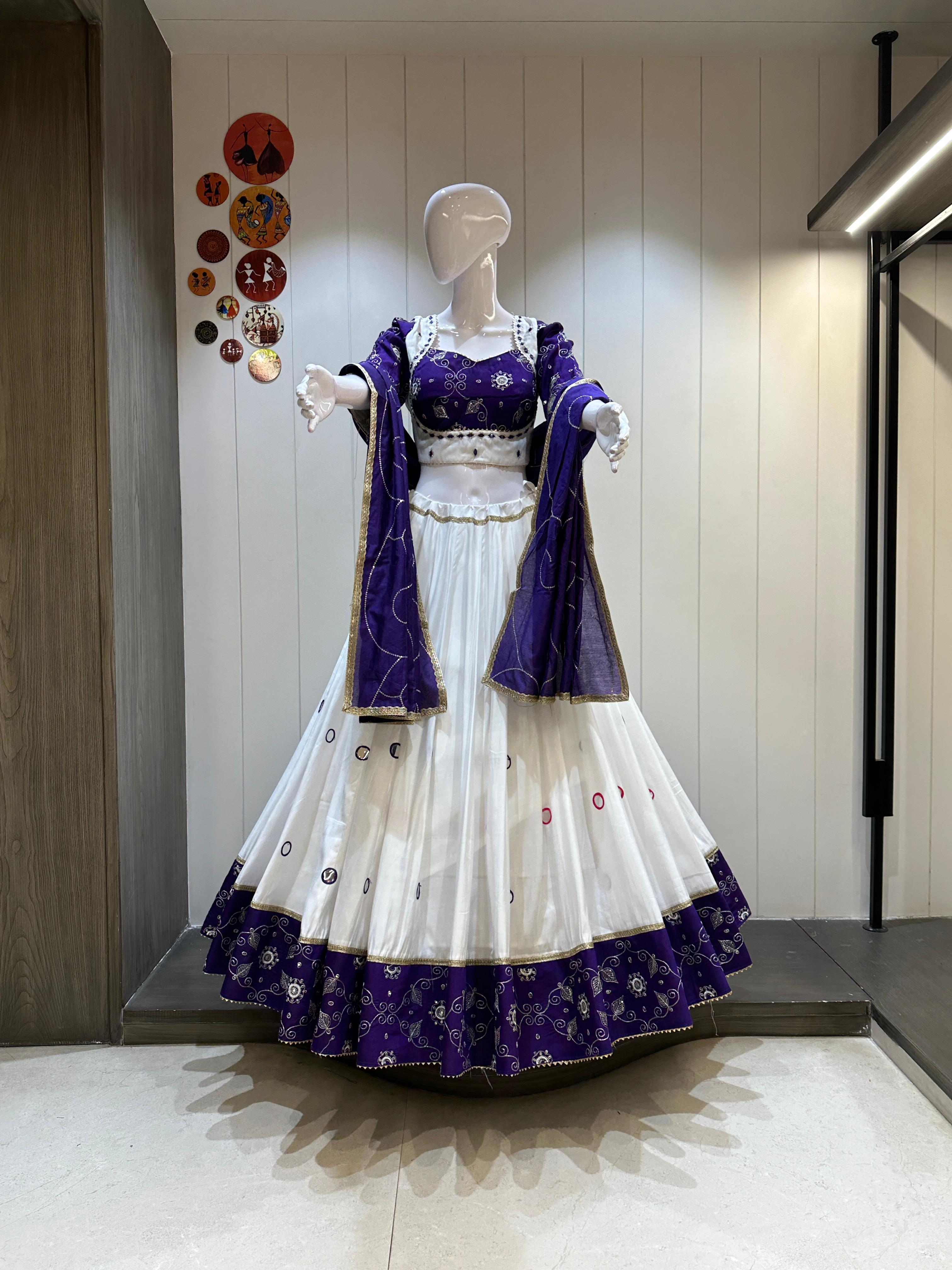 White chaniya choli with blue dupatta for Navratri 