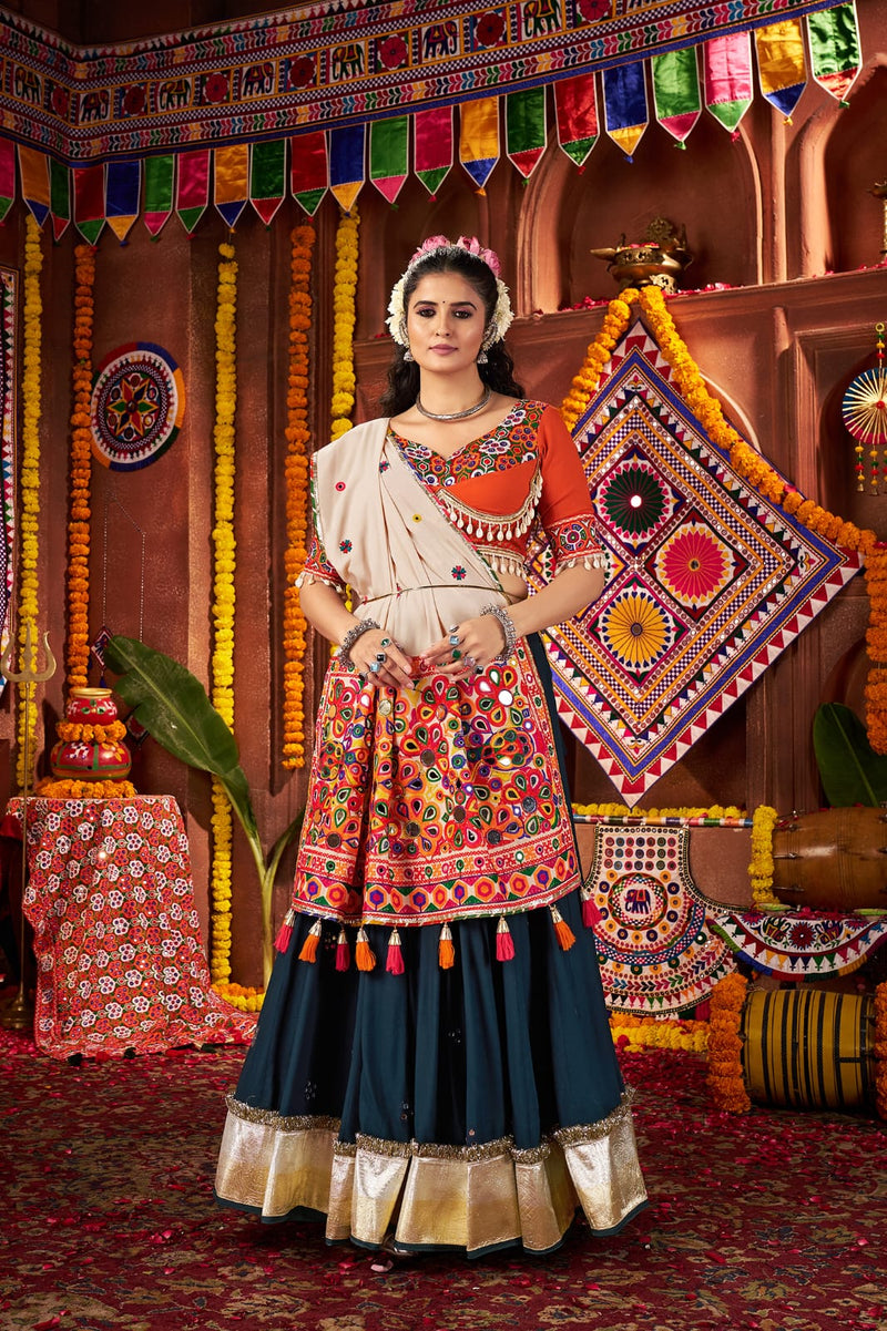 Teal blue chaniya choli with kutchi and mirror work for navratri