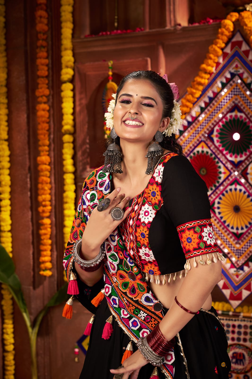 Black kutchi chaniya choli with mirror work for navratri