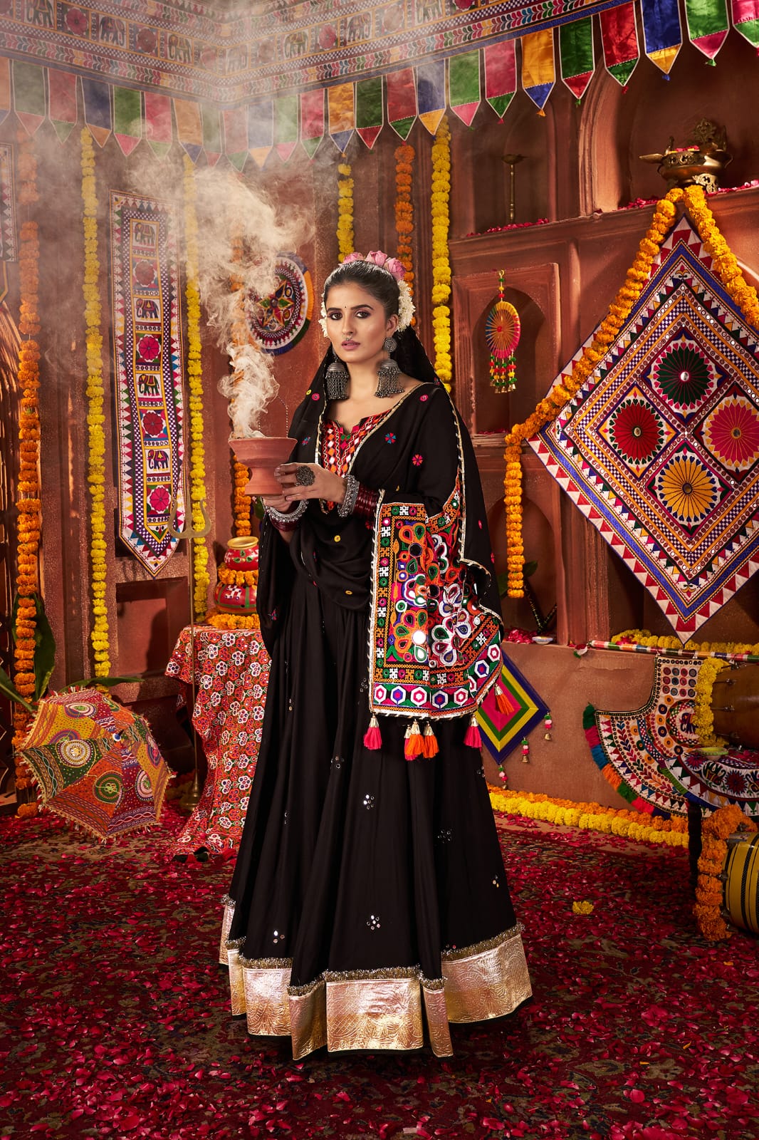 Black kutchi chaniya choli with mirror work for navratri